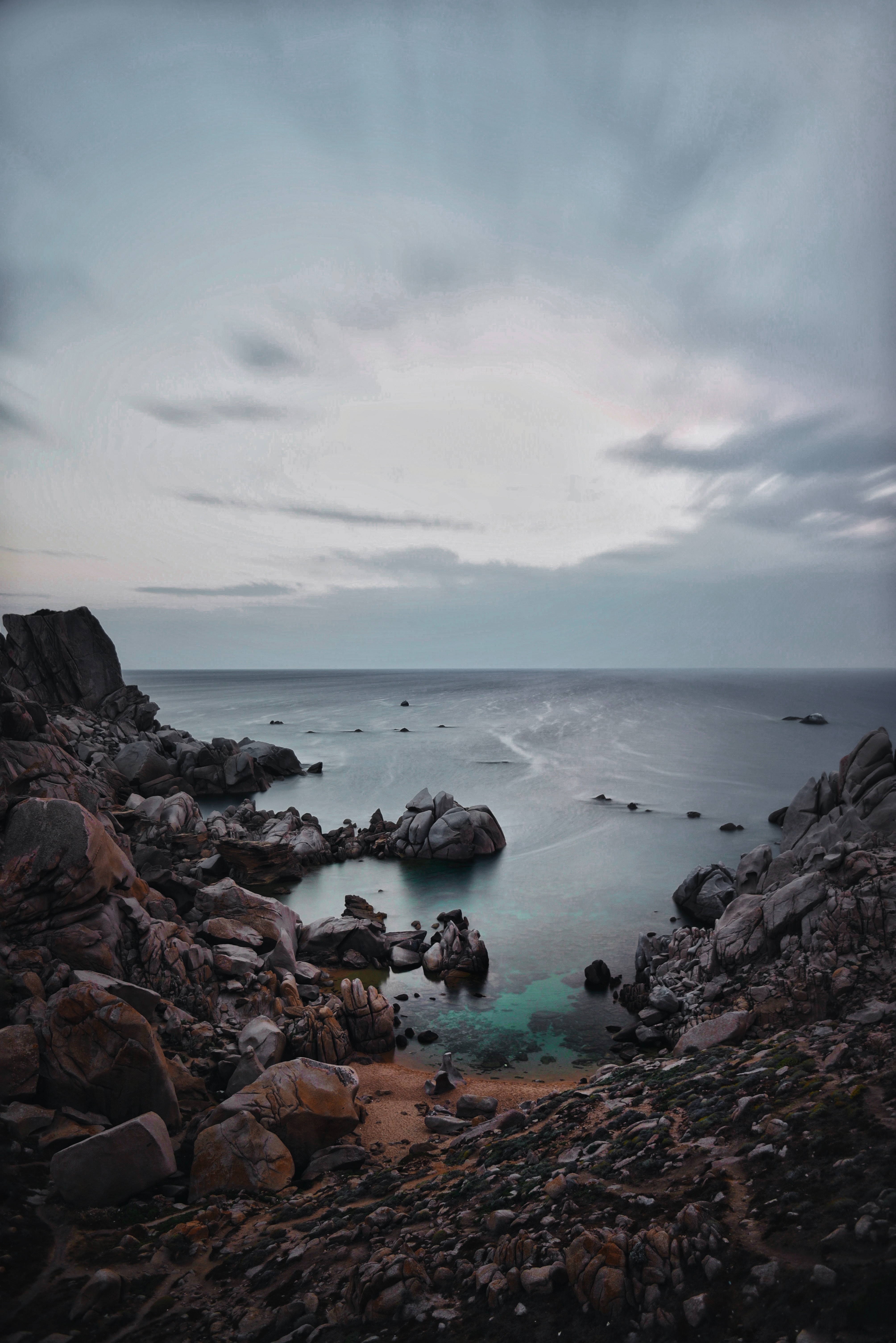 Download mobile wallpaper Rocks, Sunset, Sea, Sky, Nature for free.