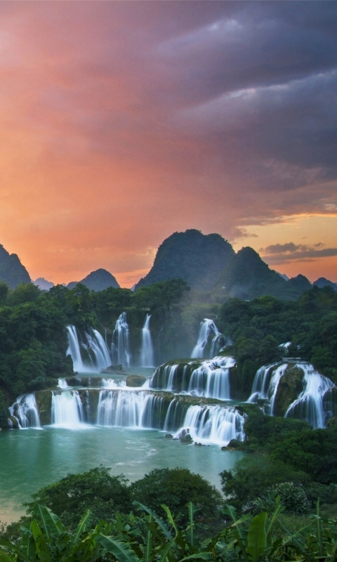 Download mobile wallpaper Sunset, Waterfalls, Mountain, Earth, Vietnam, Ban Gioc Waterfall, Guichin River, Quây Sơn River, Ban Gioc Detian Falls for free.