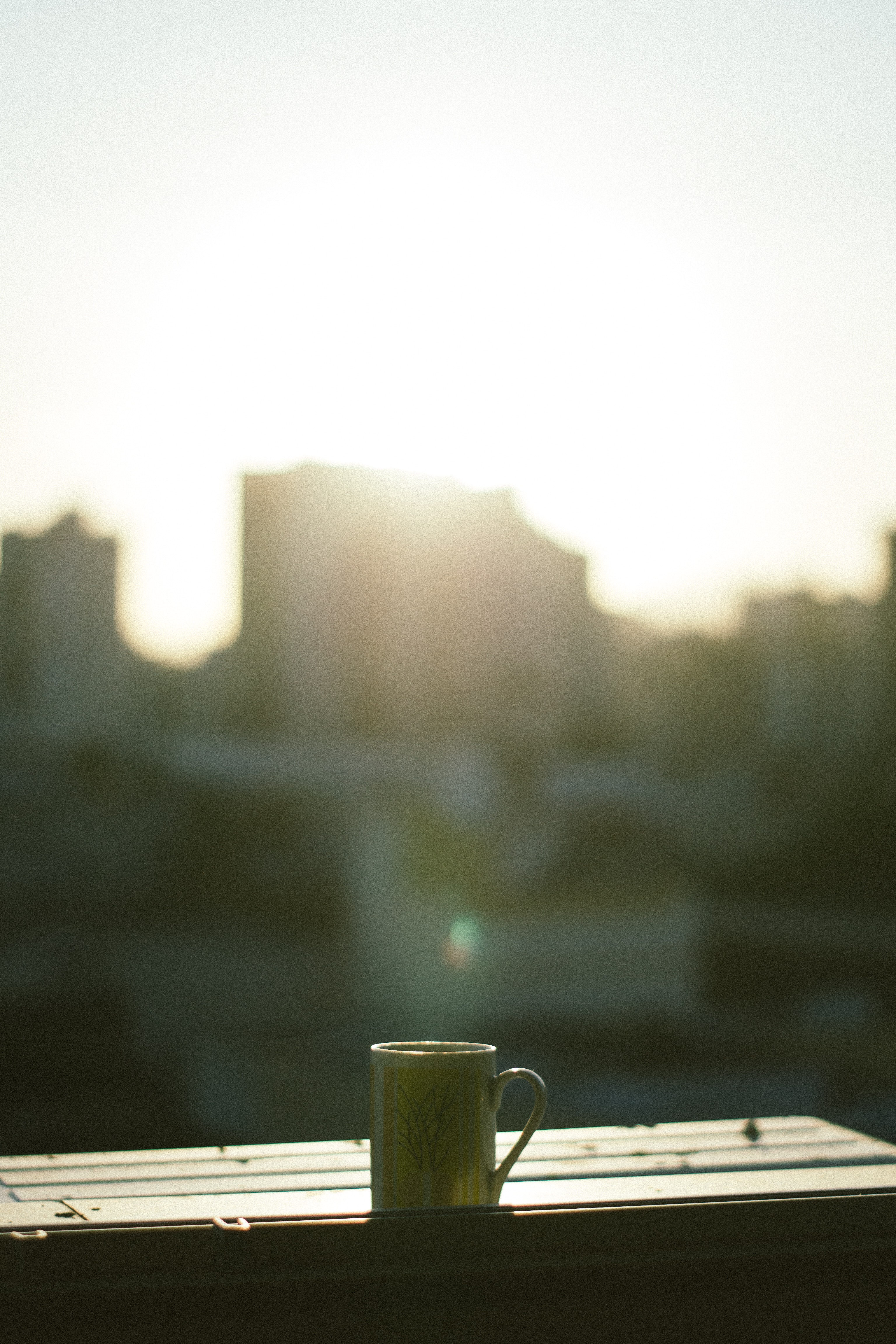 Download mobile wallpaper Sunlight, Miscellanea, Miscellaneous, Mug, Smooth, Cup, Blur, Mood for free.