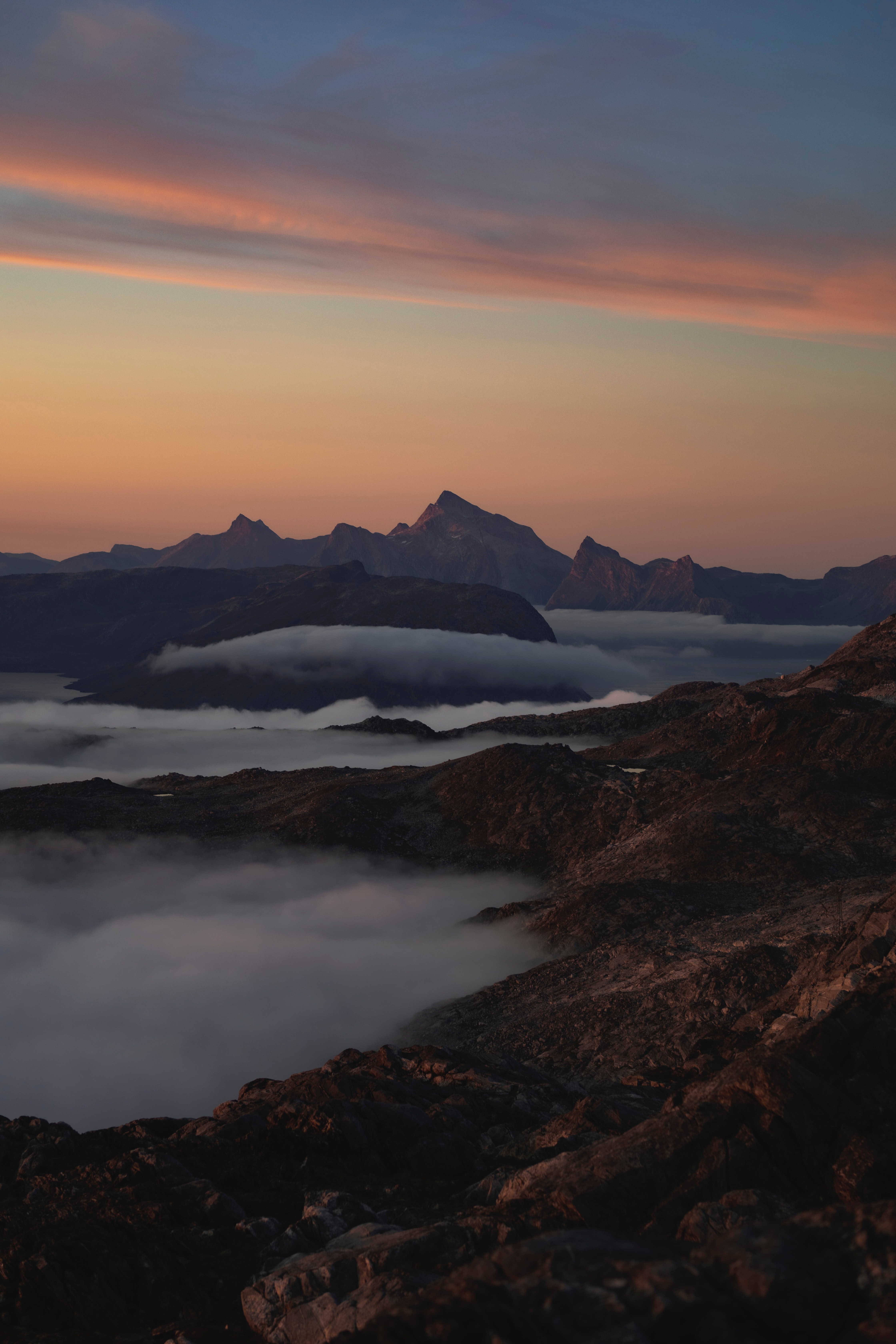 Download mobile wallpaper Fog, Dusk, Clouds, Twilight, Nature, Mountains, Landscape for free.