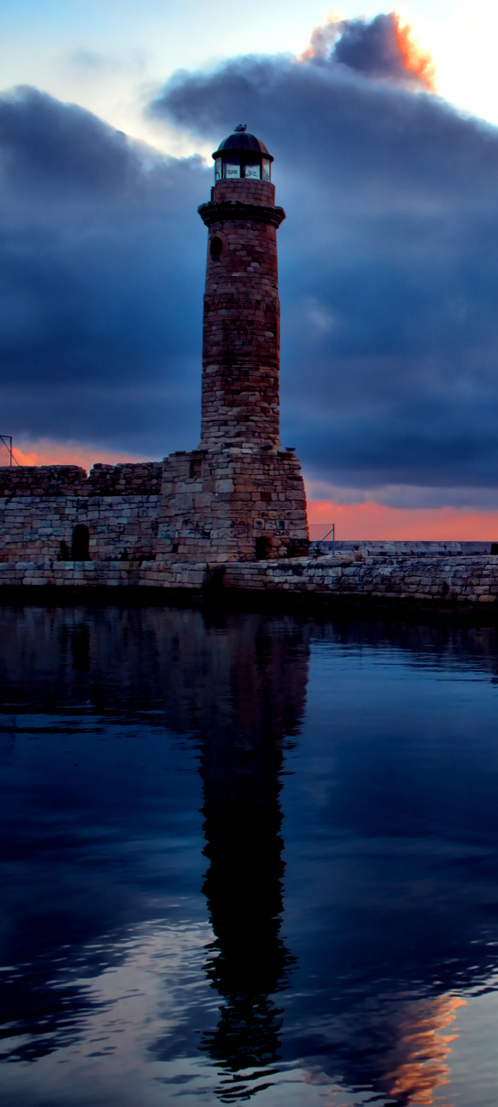 Download mobile wallpaper Sunset, Lighthouse, Man Made for free.