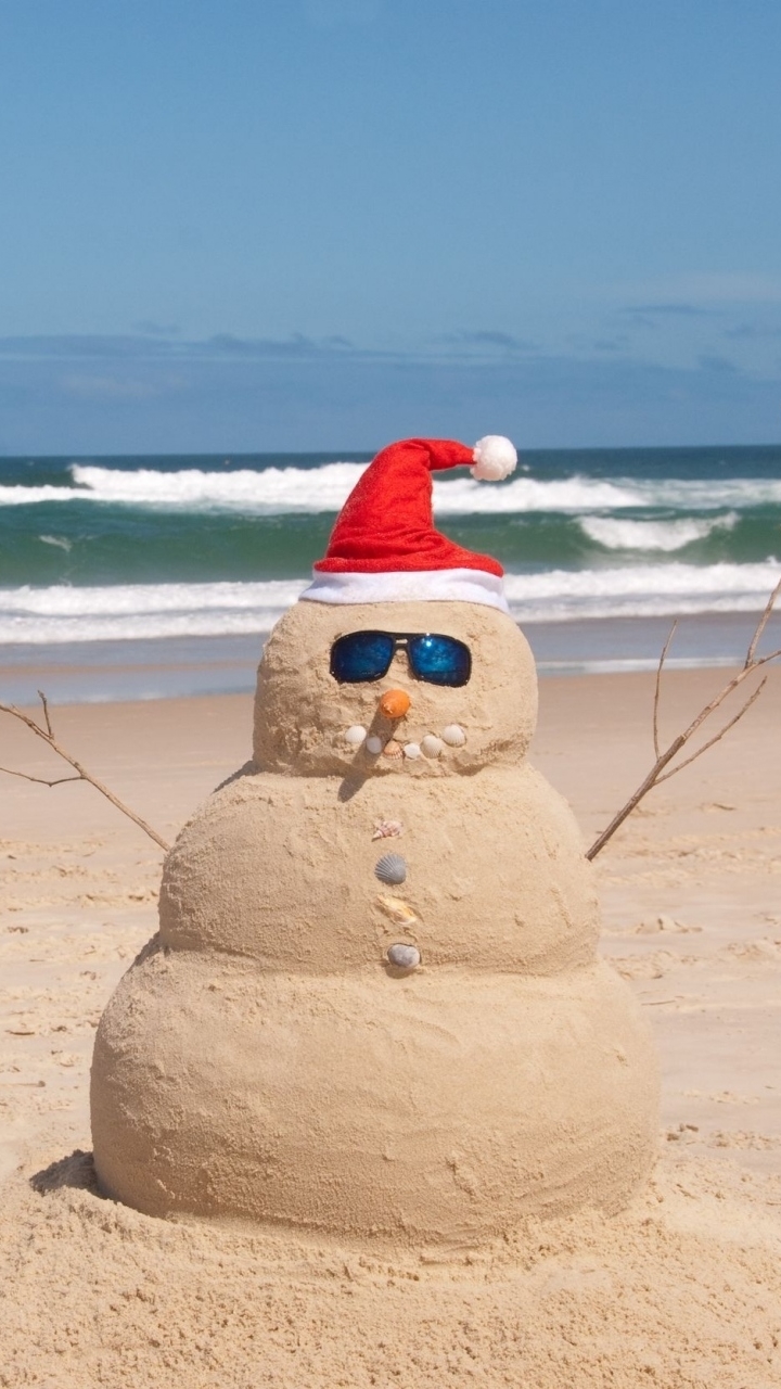 Download mobile wallpaper Sea, Beach, Sand, Snowman, Horizon, Christmas, Sunglasses, Humor, Santa Hat for free.