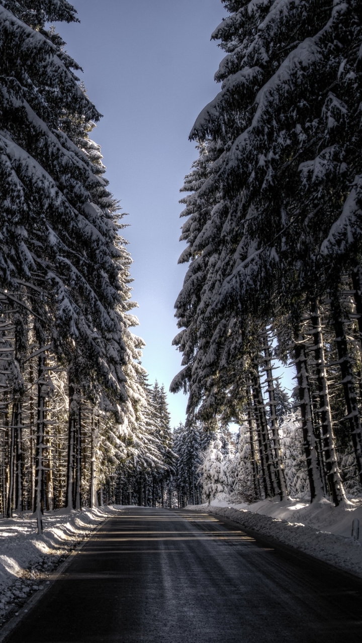 Download mobile wallpaper Winter, Nature, Snow, Road, Forest, Tree, Man Made for free.
