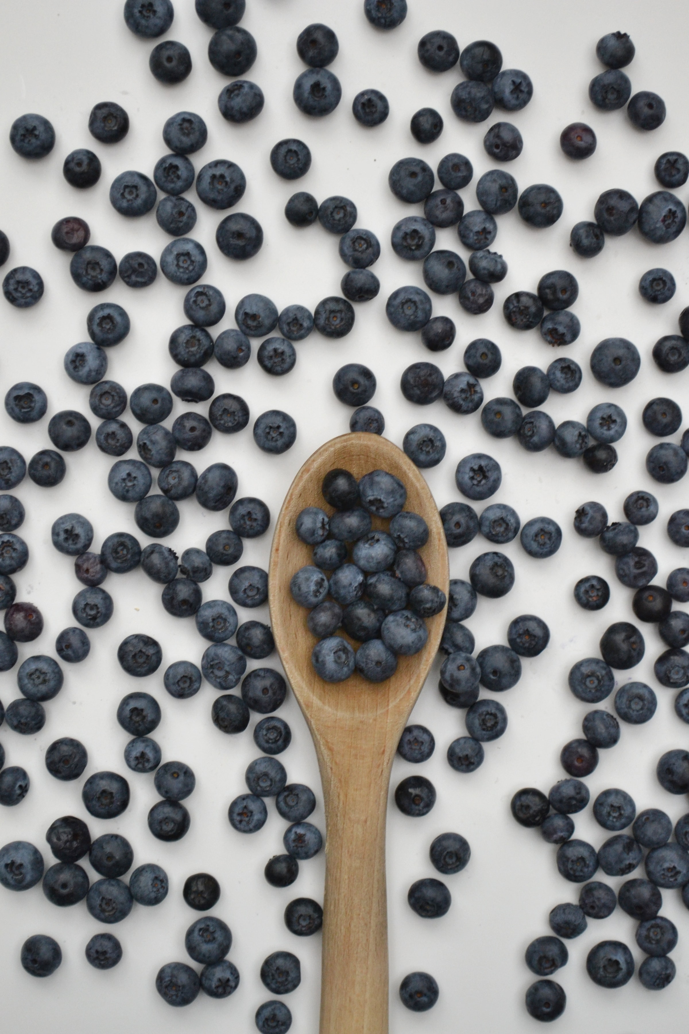 Download mobile wallpaper Spoon, Bilberries, Berry, Food, Fruits for free.