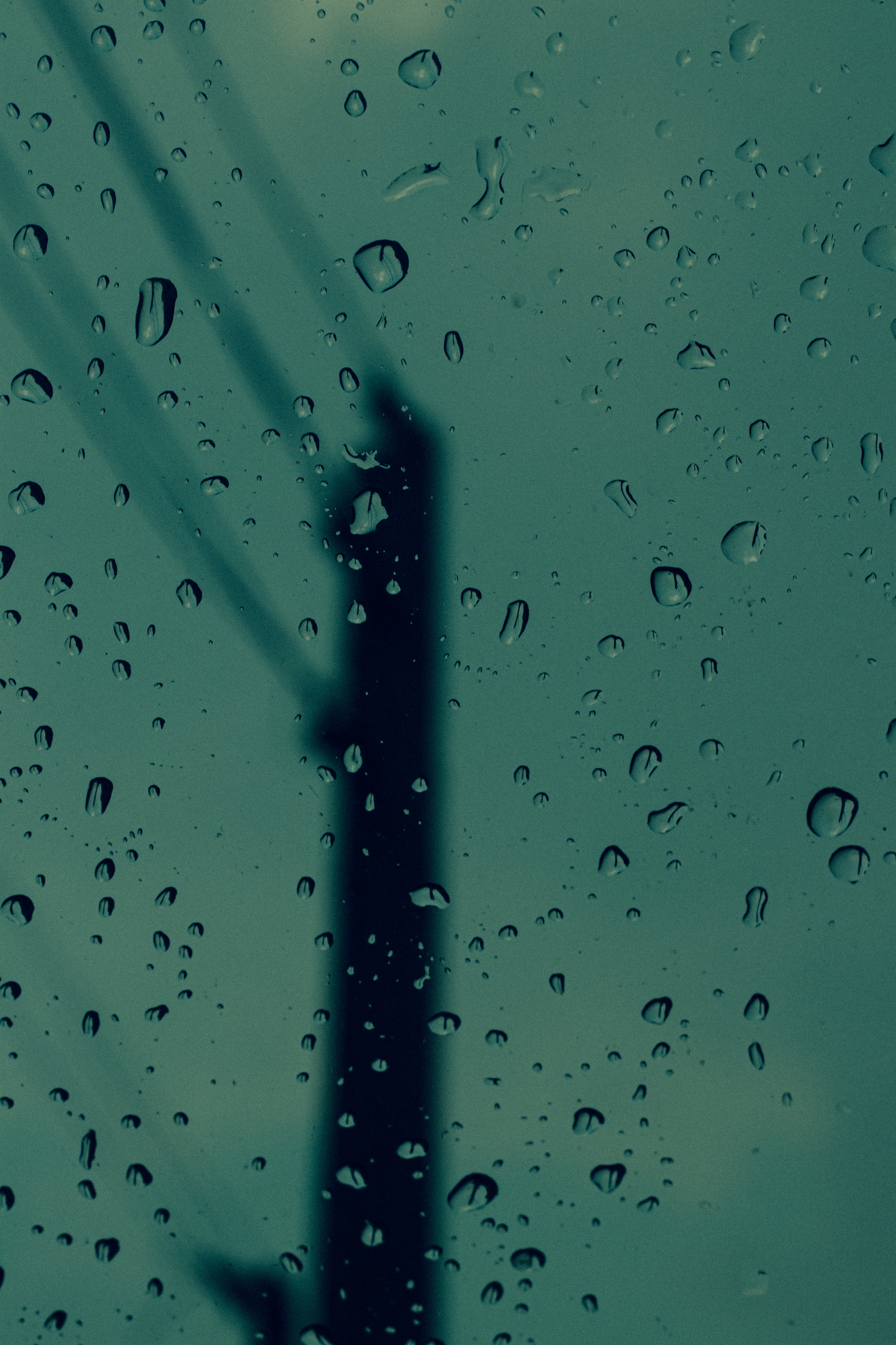 Download mobile wallpaper Silhouette, Macro, Water, Smooth, Drops, Glass, Blur for free.