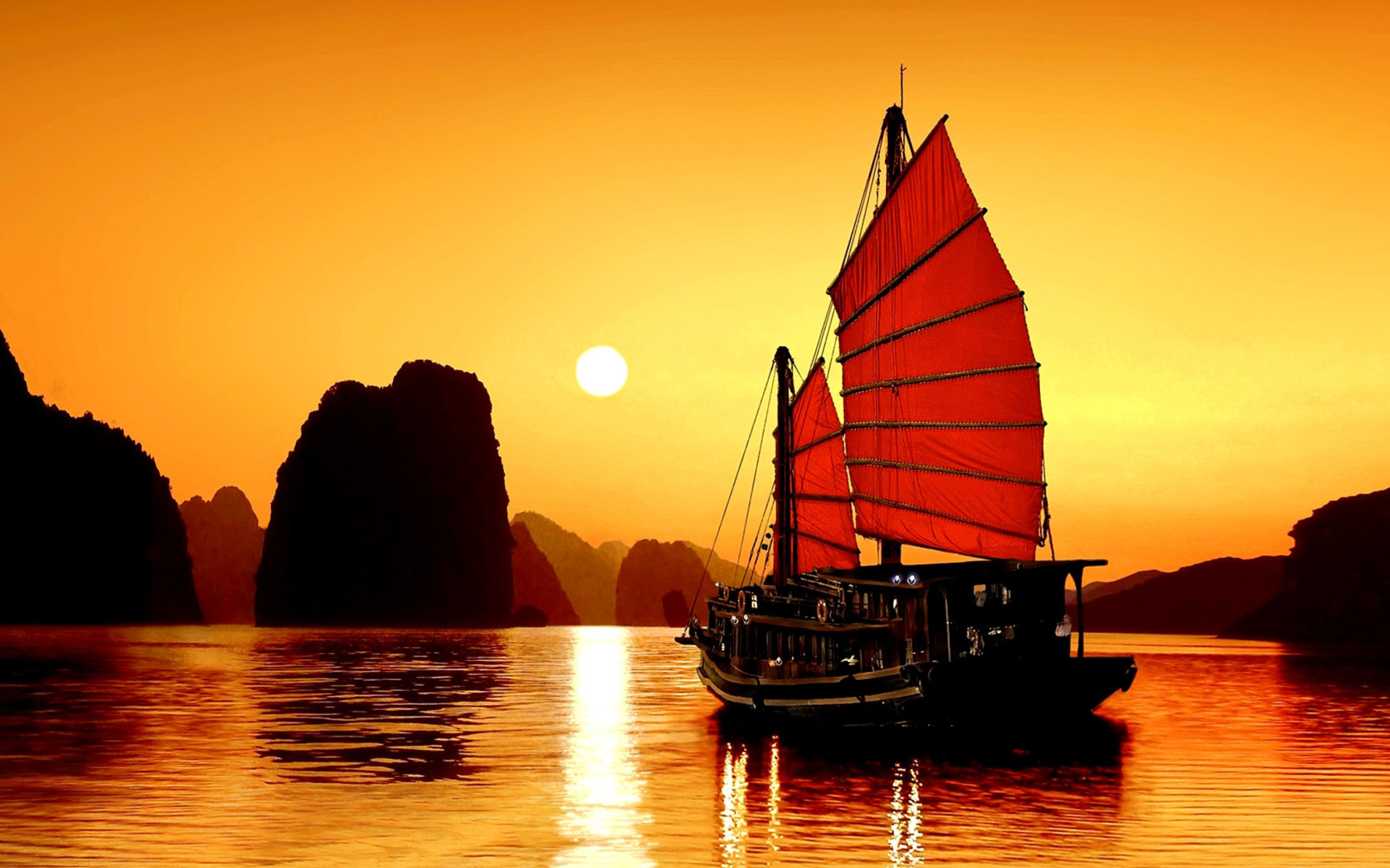 746208 descargar imagen velero, la bahía de halong, vehículos, barco, sol, atardecer, vietnam: fondos de pantalla y protectores de pantalla gratis