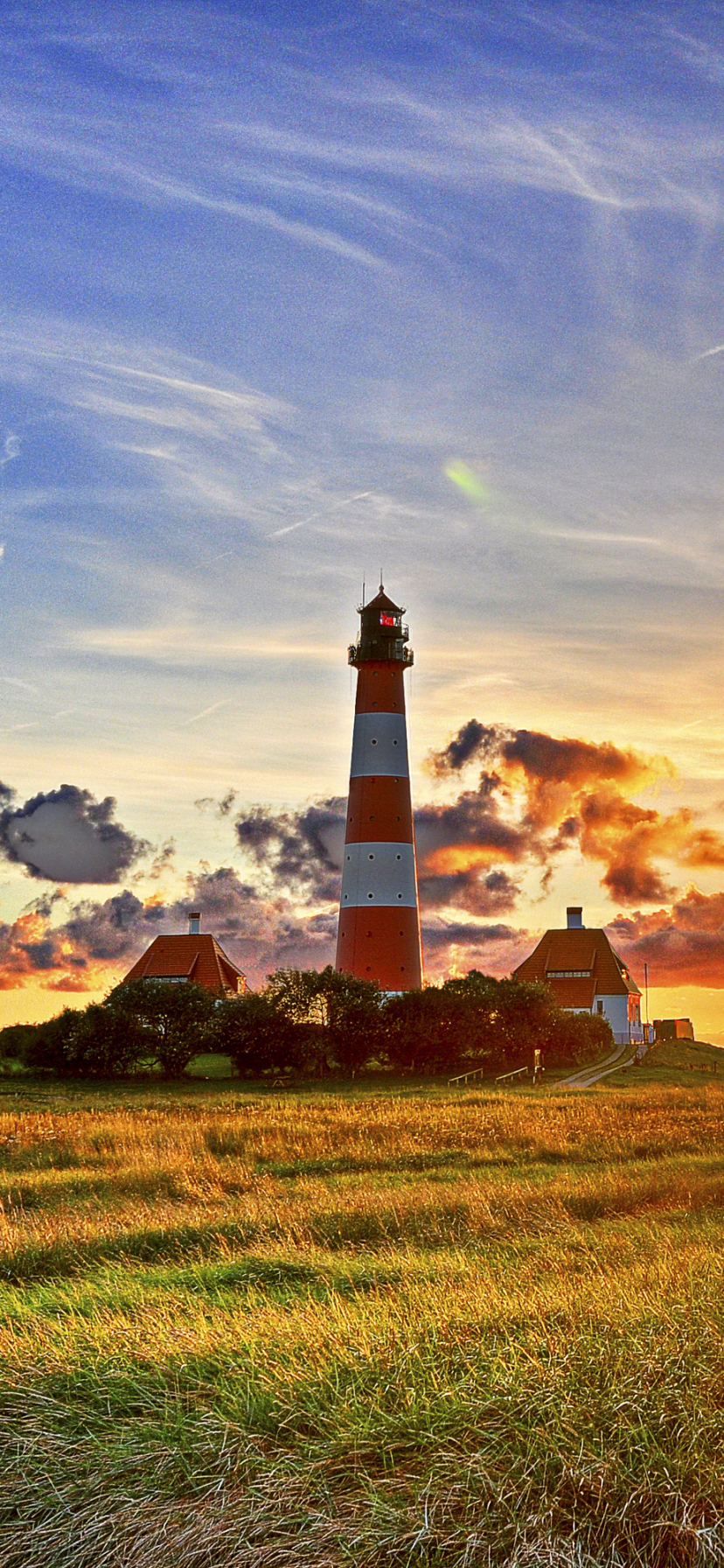 Download mobile wallpaper Sunset, Sky, Horizon, Lighthouse, Sunbeam, Man Made, Sunbean for free.