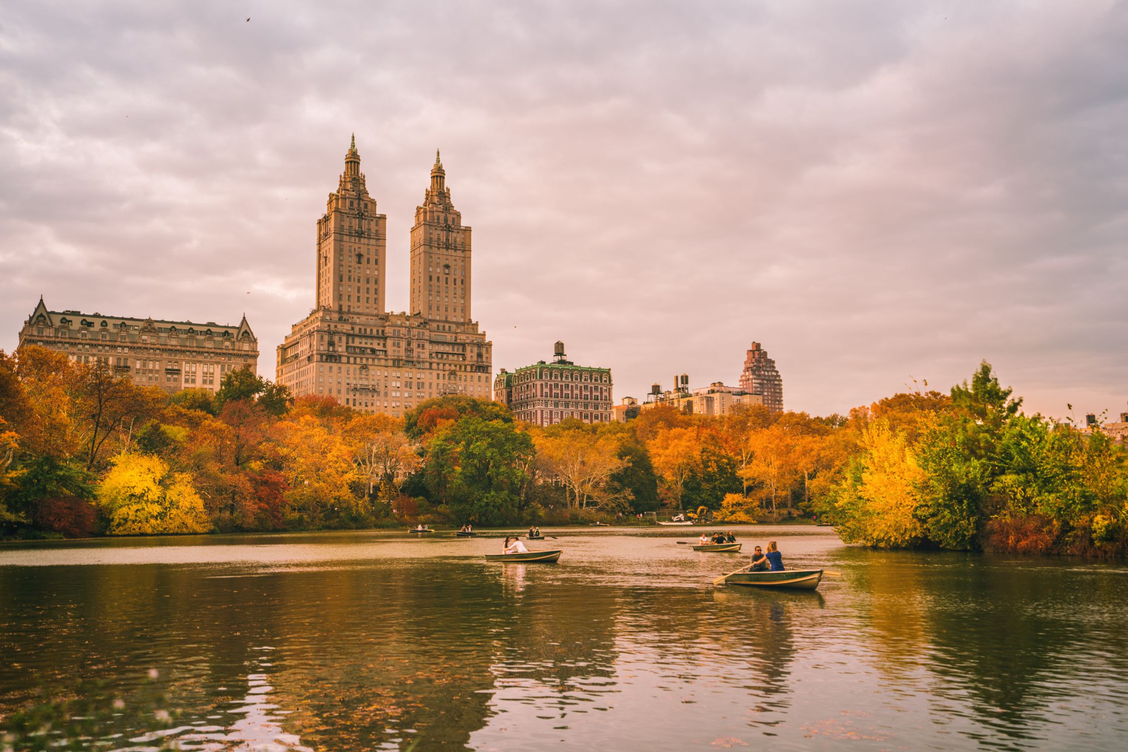 Download mobile wallpaper Water, Architecture, Building, Lake, Park, Fall, Boat, Colorful, New York, Central Park, Man Made for free.
