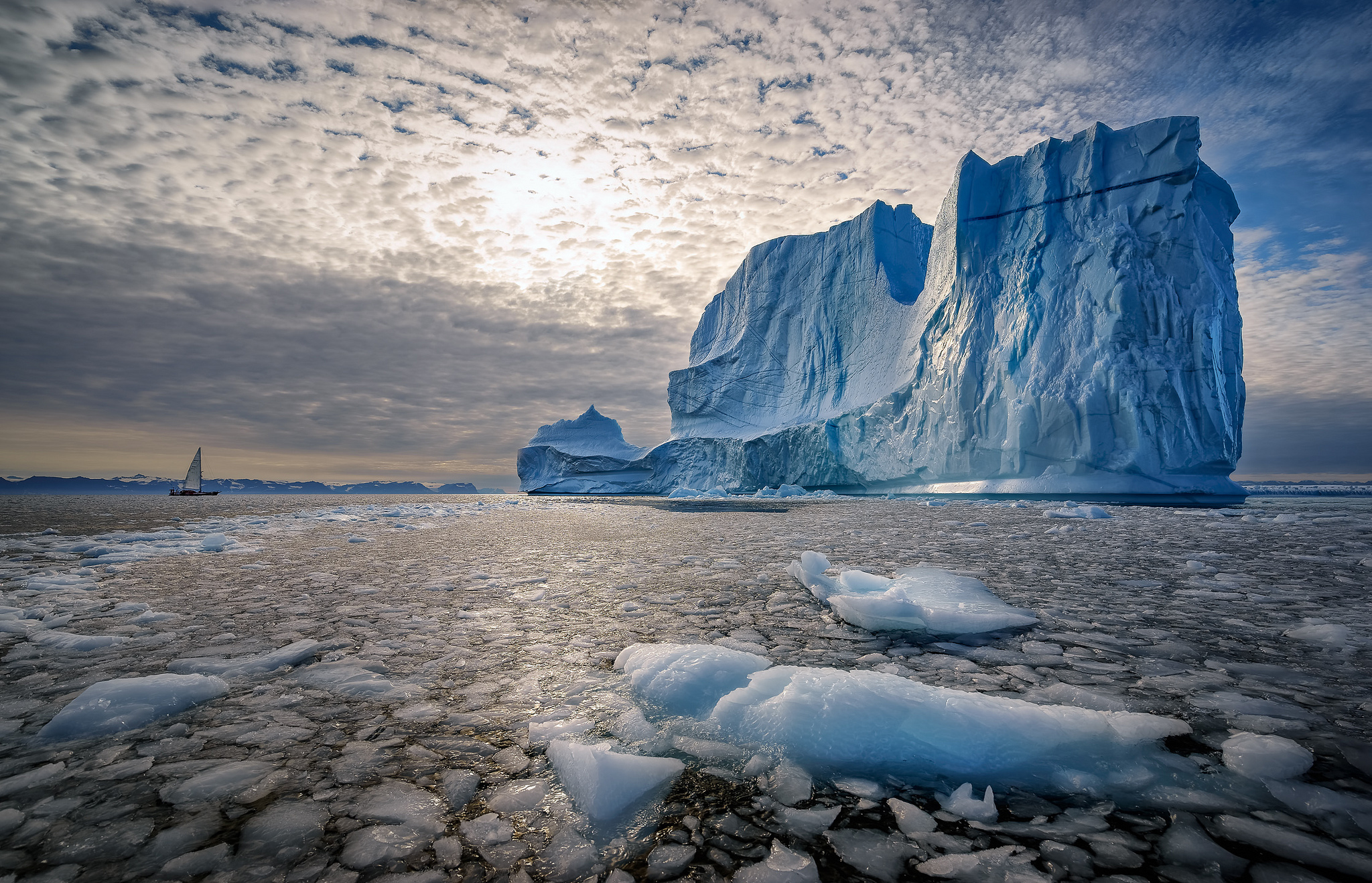 Download mobile wallpaper Nature, Sky, Ice, Ocean, Earth, Sailboat, Cloud, Iceberg for free.
