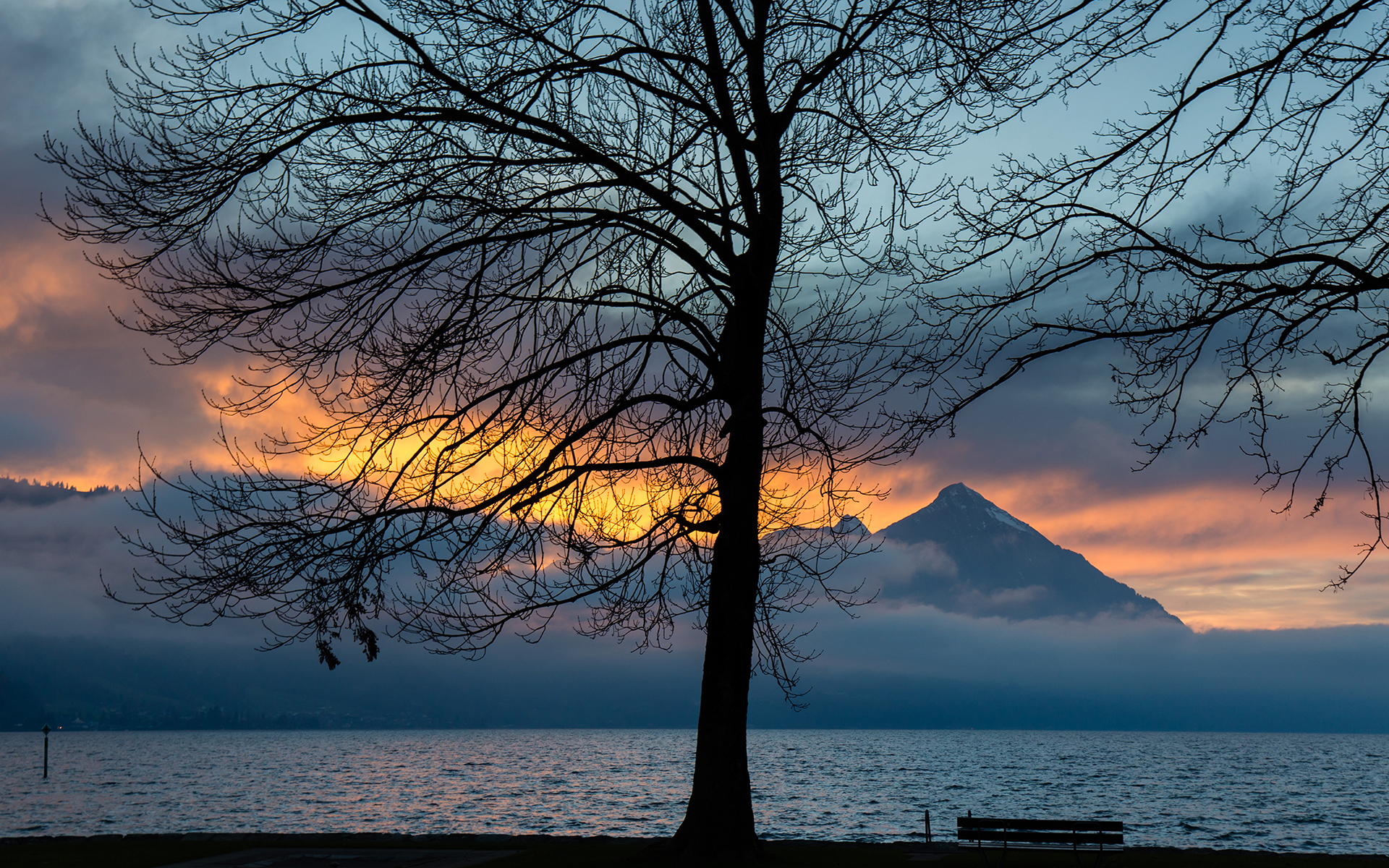 Download mobile wallpaper Sunset, Mountain, Lake, Silhouette, Tree, Earth for free.