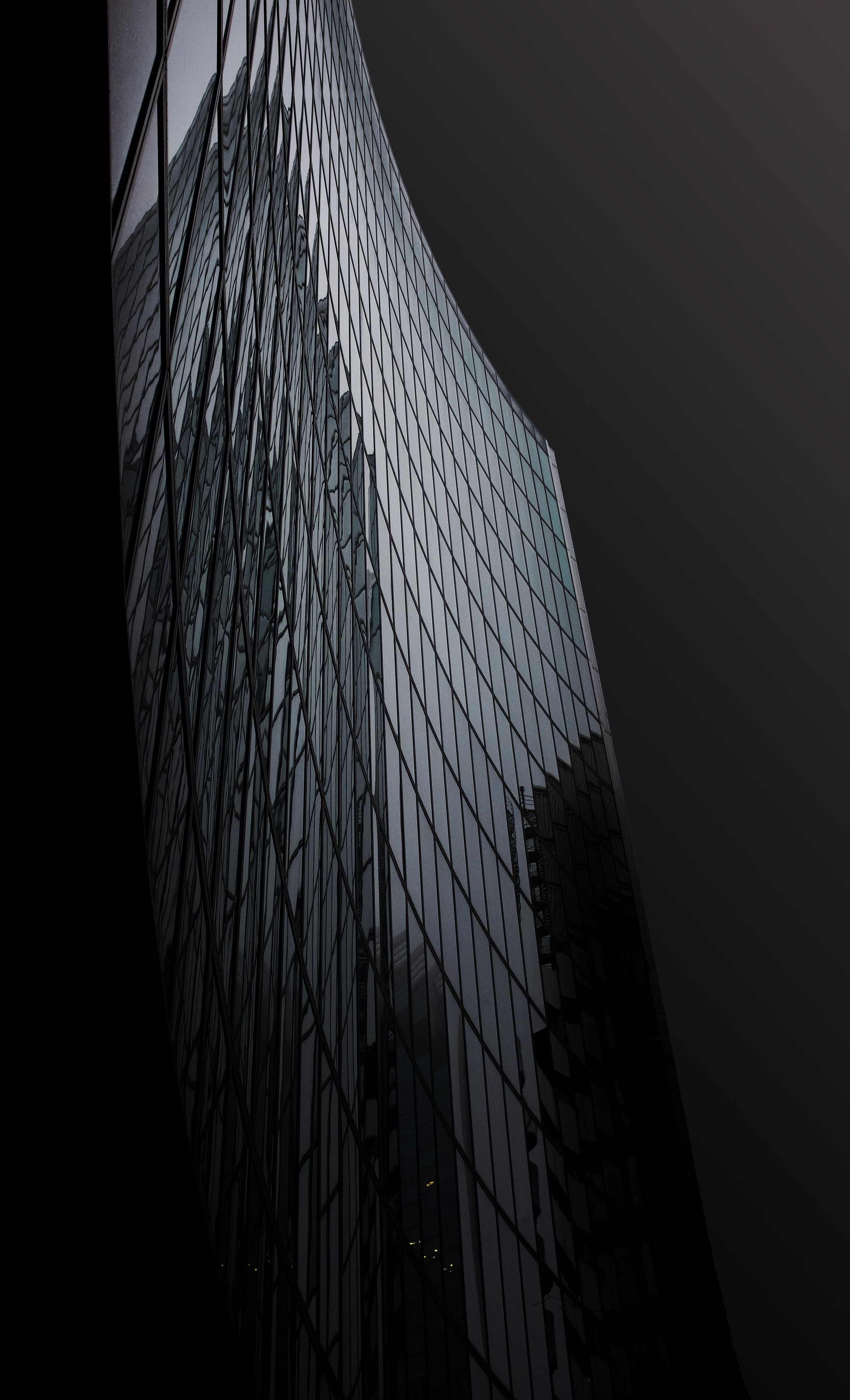 Download mobile wallpaper Reflection, Building, Facade, Glass, Dark for free.