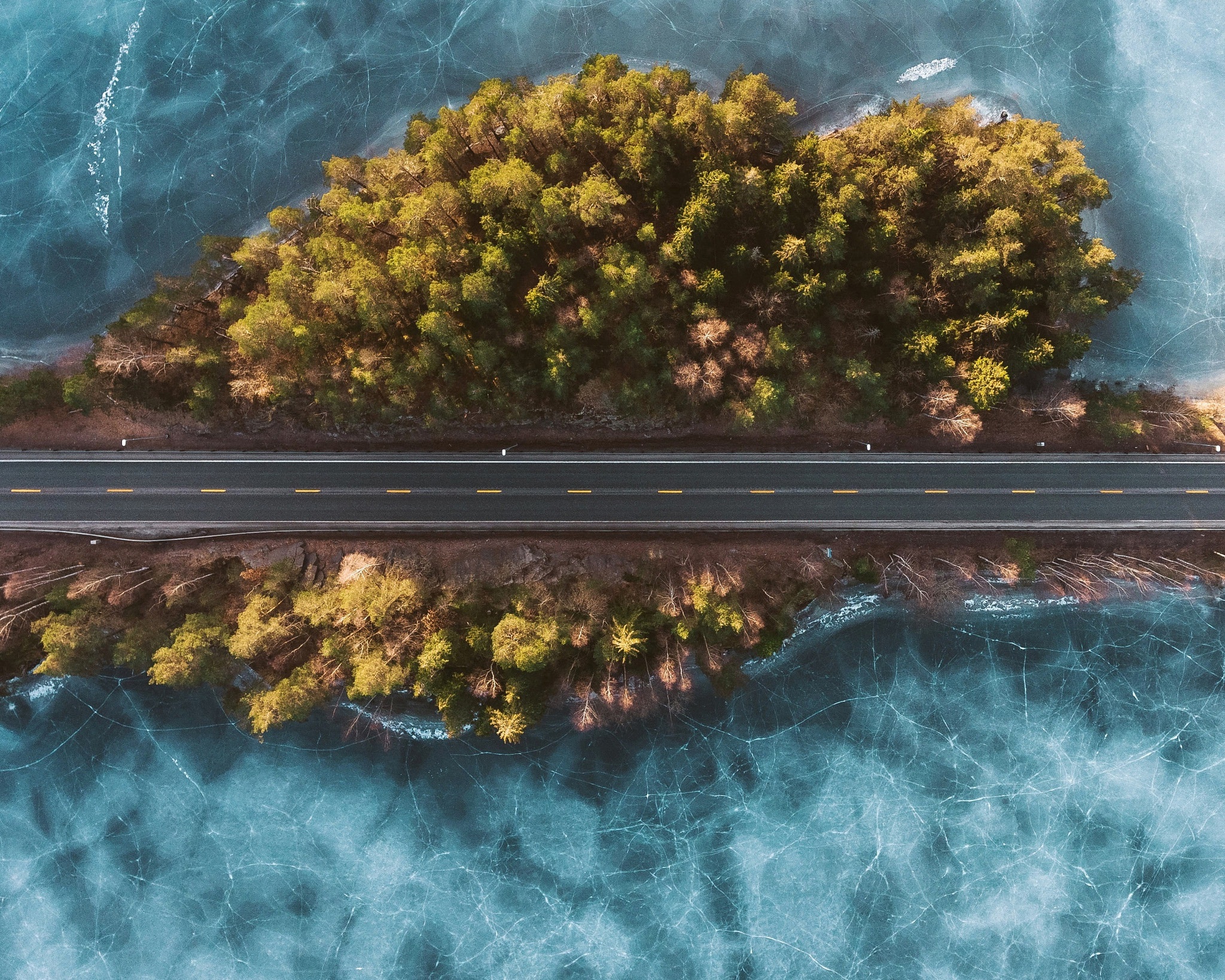 Download mobile wallpaper Road, Island, Frozen, Aerial, Man Made for free.