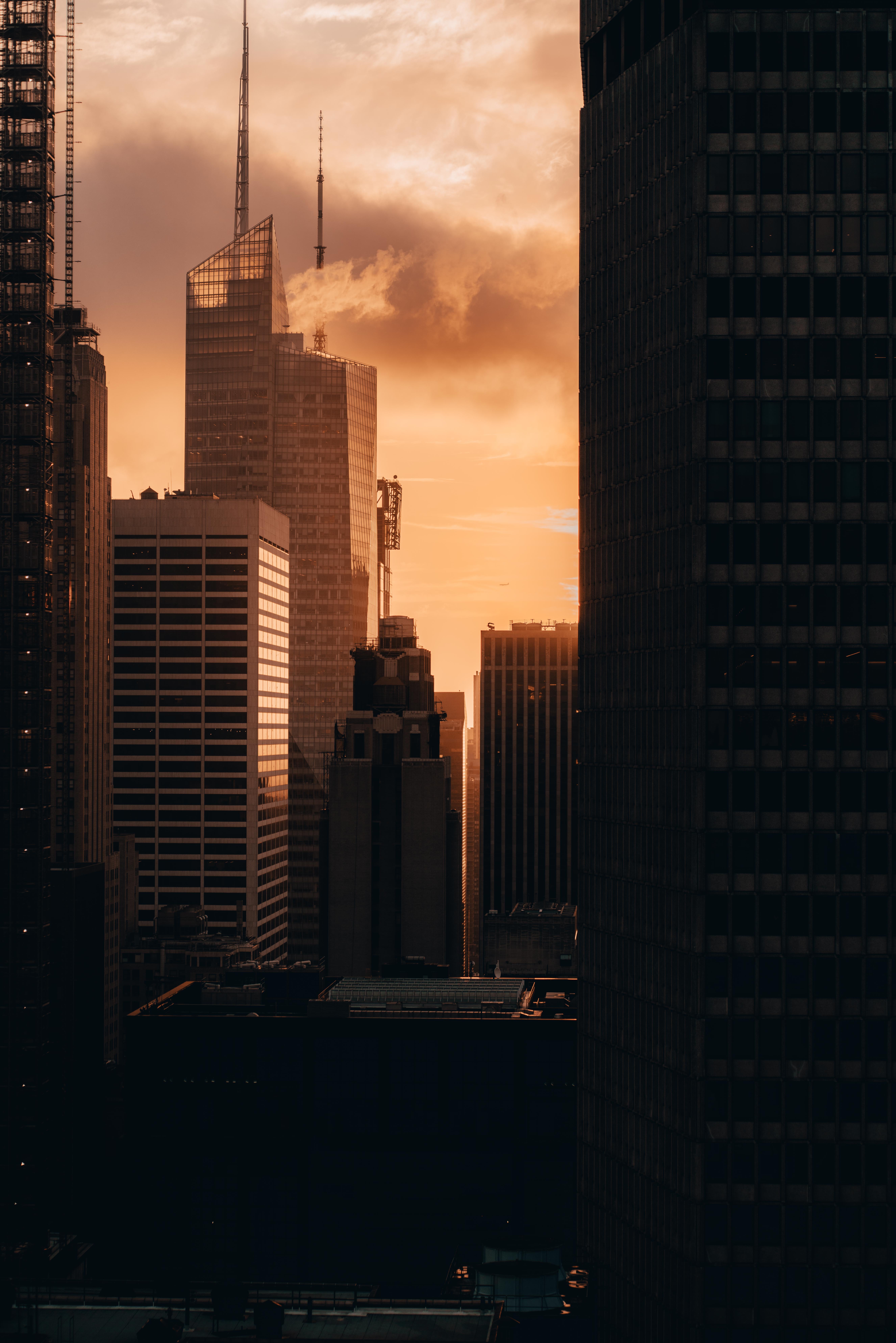 Download mobile wallpaper Skyscrapers, Building, Sunset, Cities, City, Architecture for free.