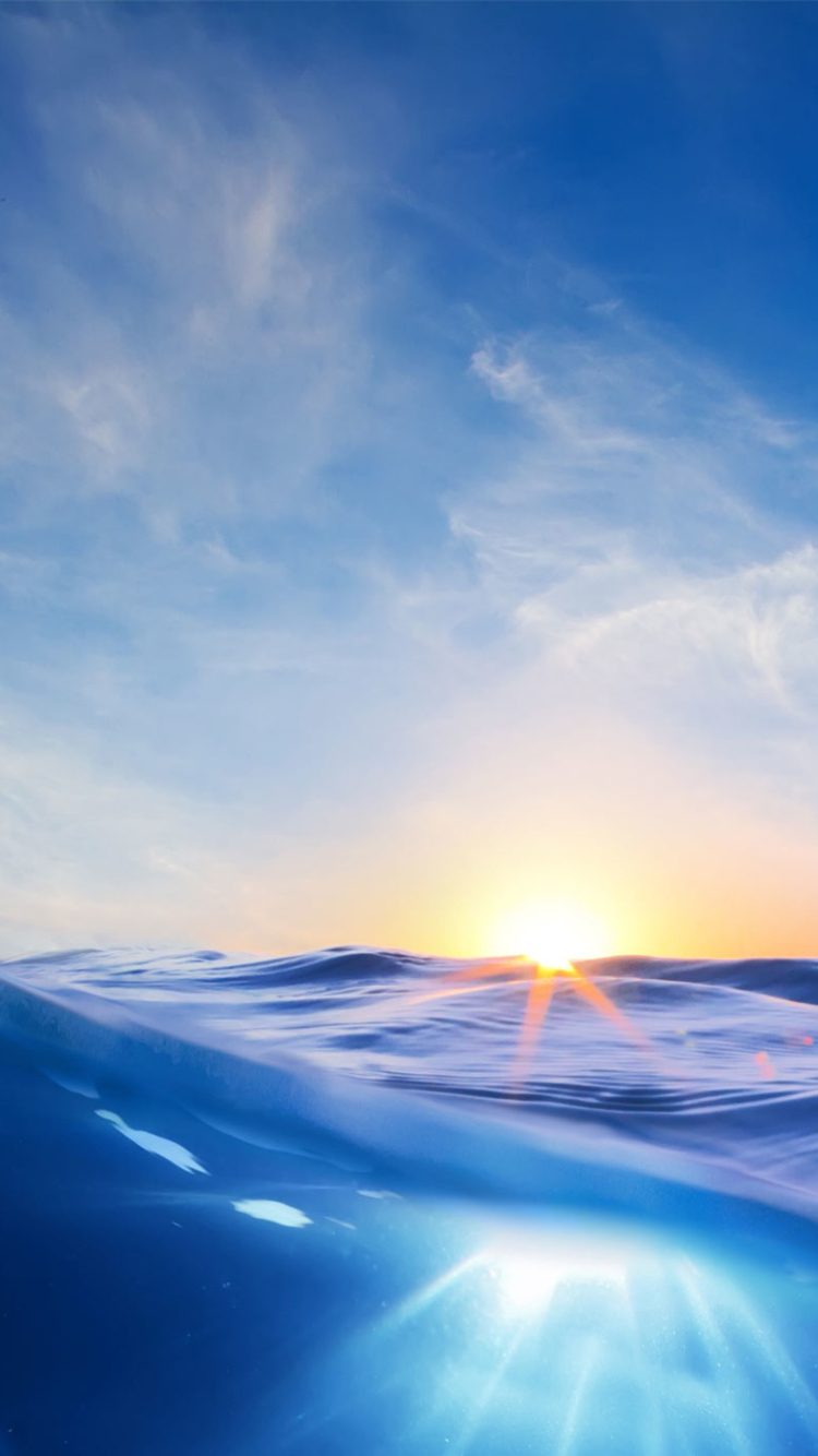 Download mobile wallpaper Sky, Sun, Ocean, Close Up, Earth, Wave for free.
