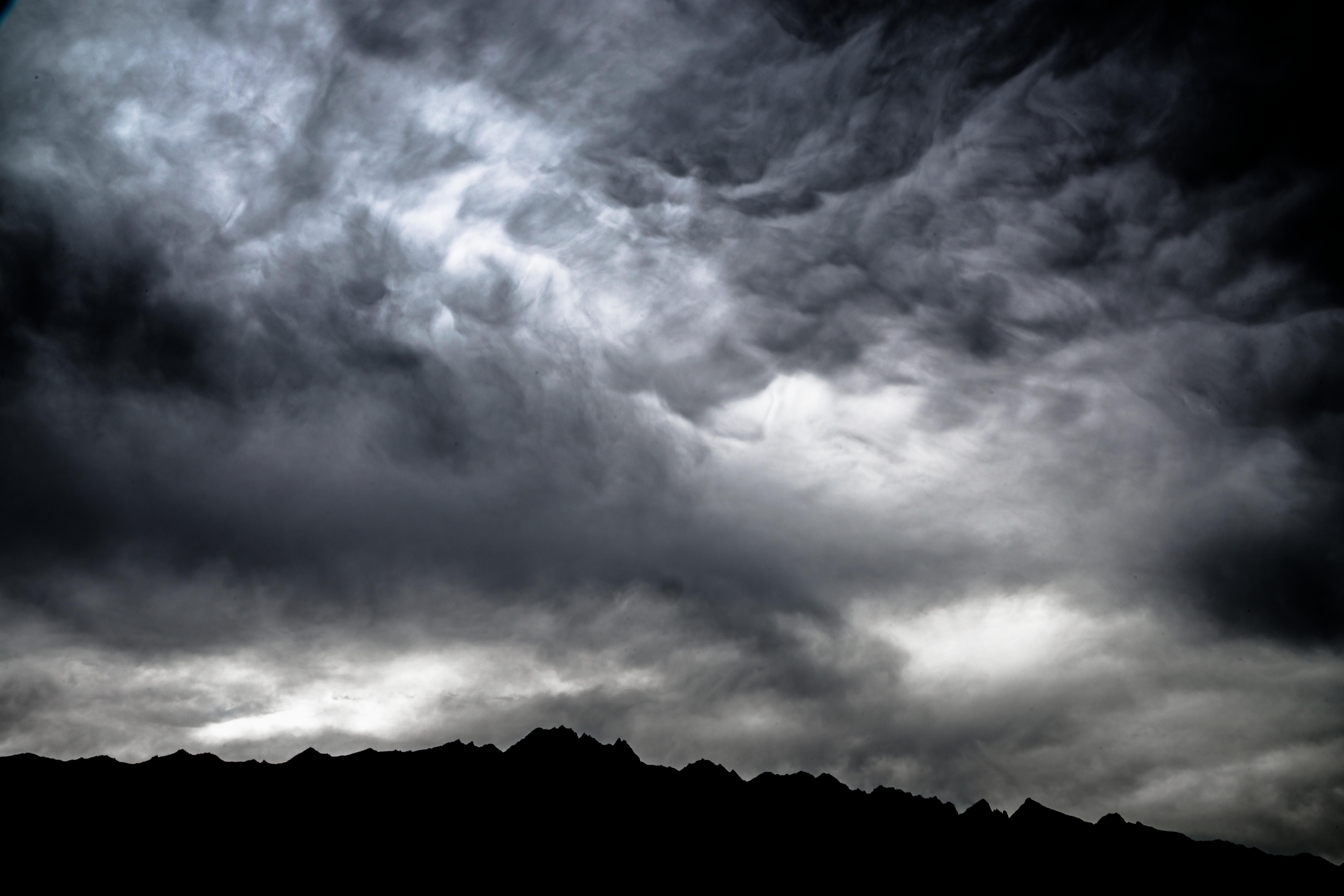 Download mobile wallpaper Clouds, Dusk, Twilight, Mountains, Nature, Storm, Dark for free.