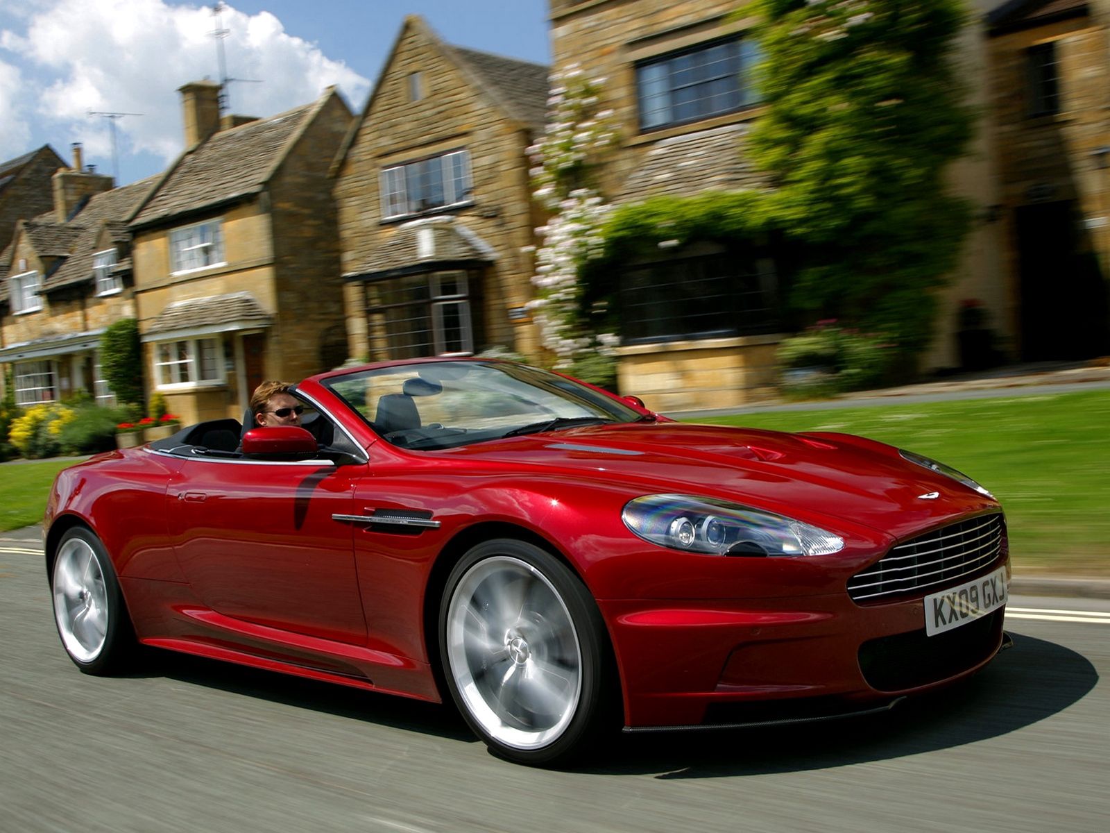 Free download wallpaper Auto, Grass, Side View, Dbs, 2009, Houses, Aston Martin, Cars on your PC desktop