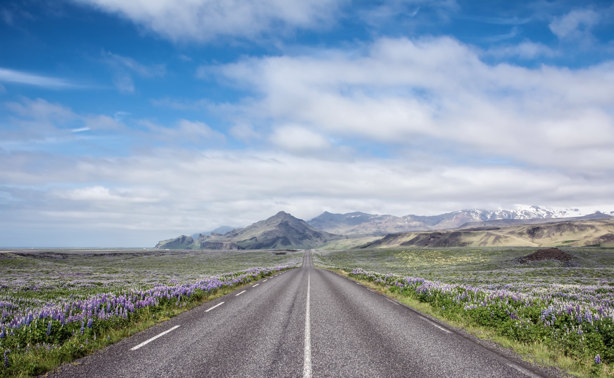 Download mobile wallpaper Landscape, Nature, Sky, Mountain, Flower, Road, Cloud, Man Made for free.