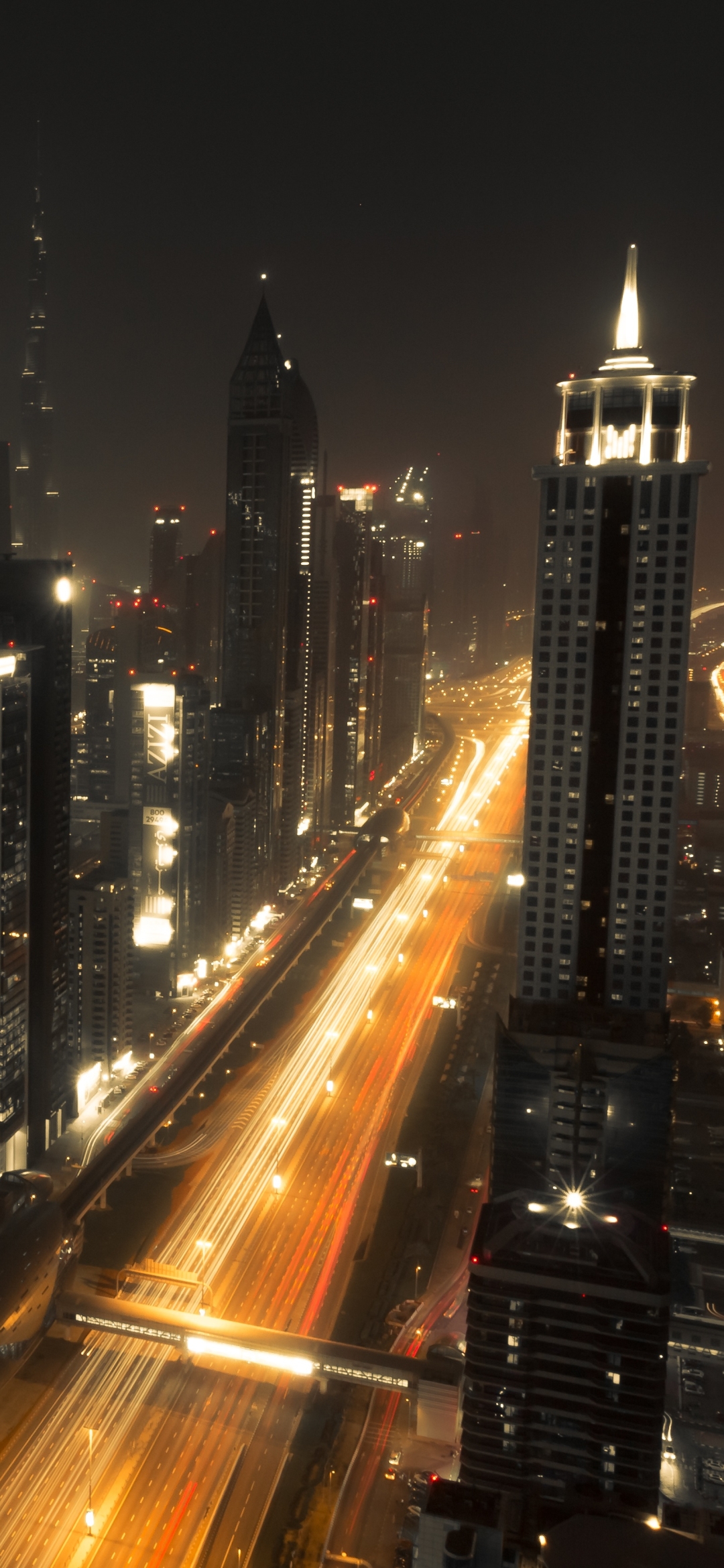 Download mobile wallpaper Cities, Night, City, Skyscraper, Building, Dubai, United Arab Emirates, Man Made, Time Lapse for free.