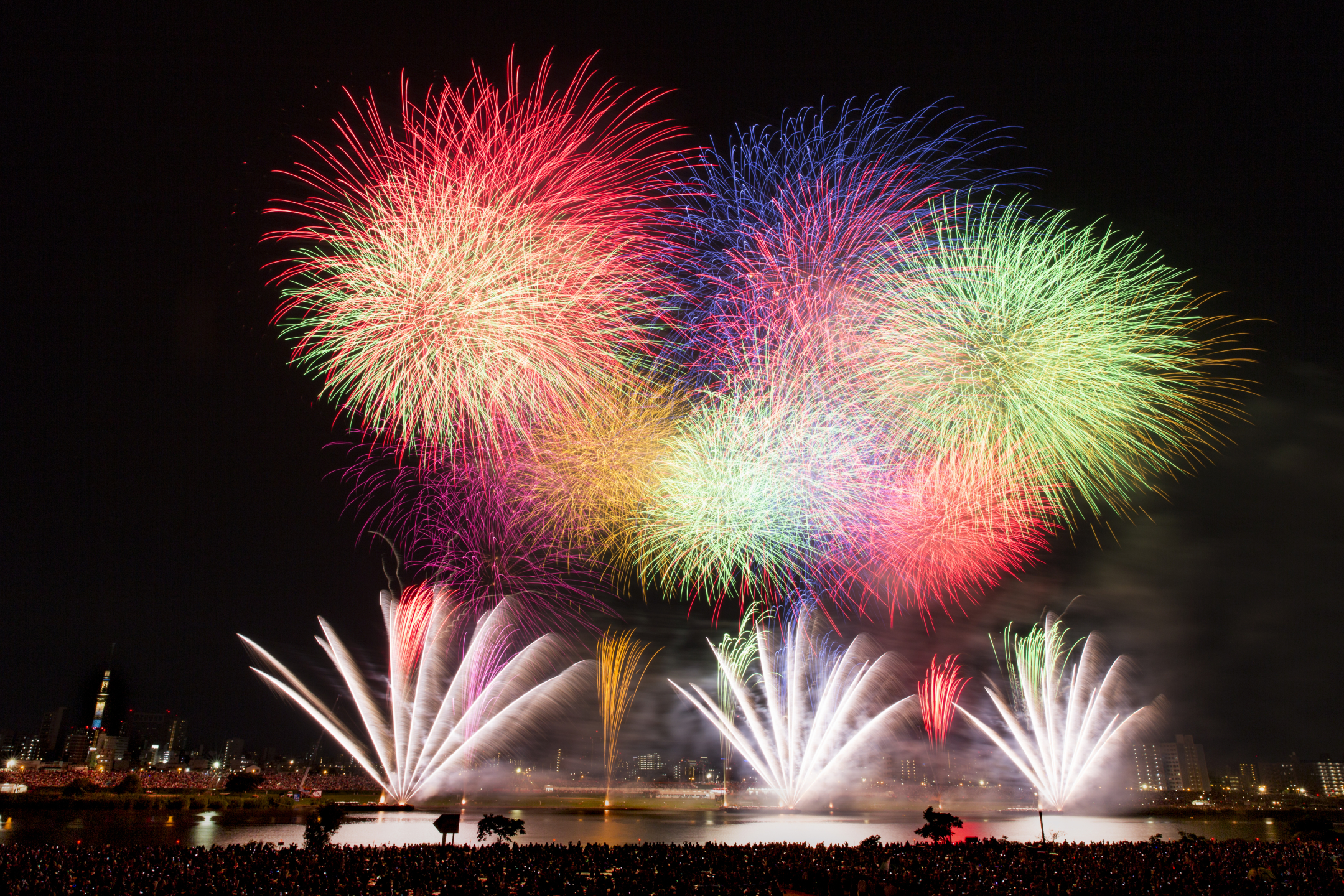 Download mobile wallpaper Night, Light, Japan, Crowd, Fireworks, Tokyo, Photography for free.