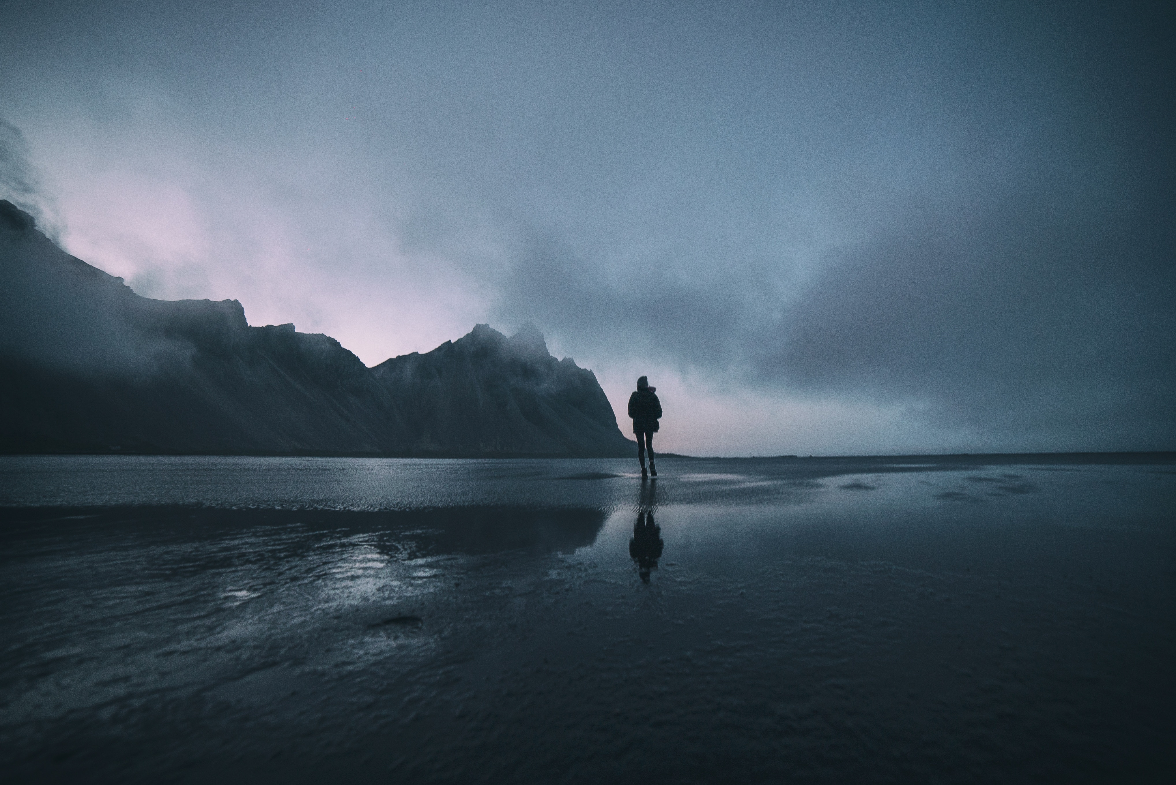 Free download wallpaper Mountains, Shore, Bank, Stroll, Person, Human, Dark, Ocean, Loneliness on your PC desktop