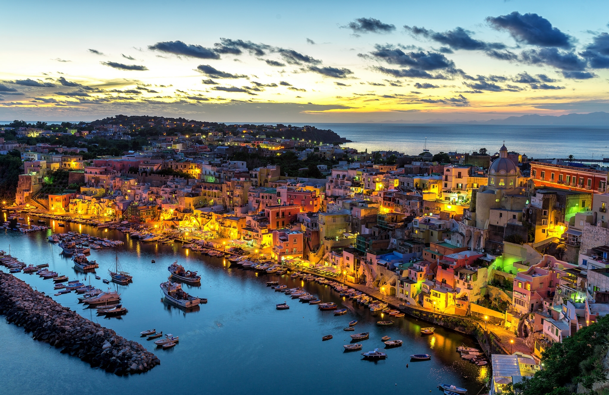 Free download wallpaper Italy, Dusk, Boat, Cityscape, Harbor, Town, Man Made, Procida, Towns on your PC desktop