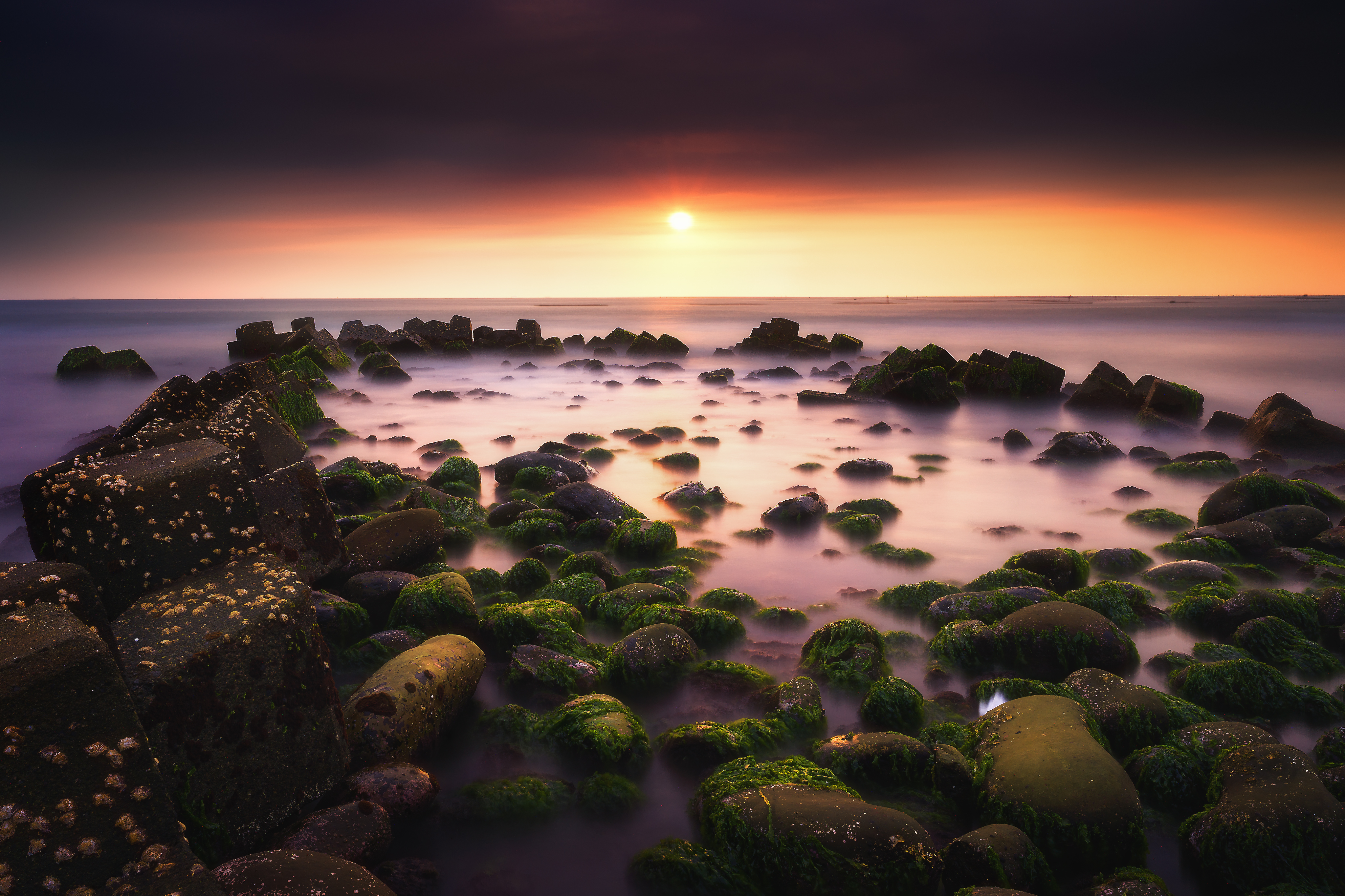 Download mobile wallpaper Stones, Horizon, Moss, Sunset, Nature for free.