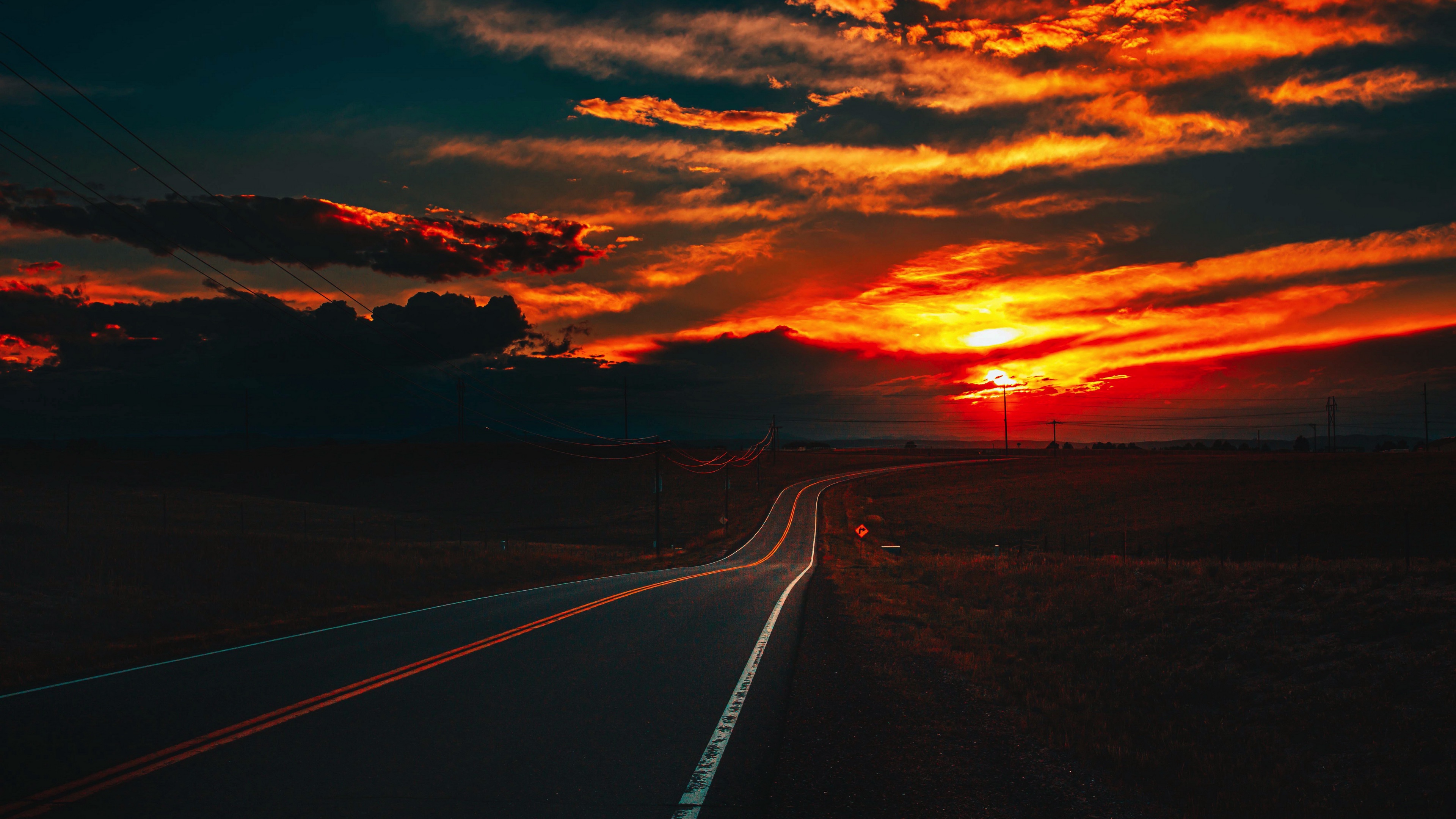 Free download wallpaper Sunset, Road, Field, Man Made on your PC desktop