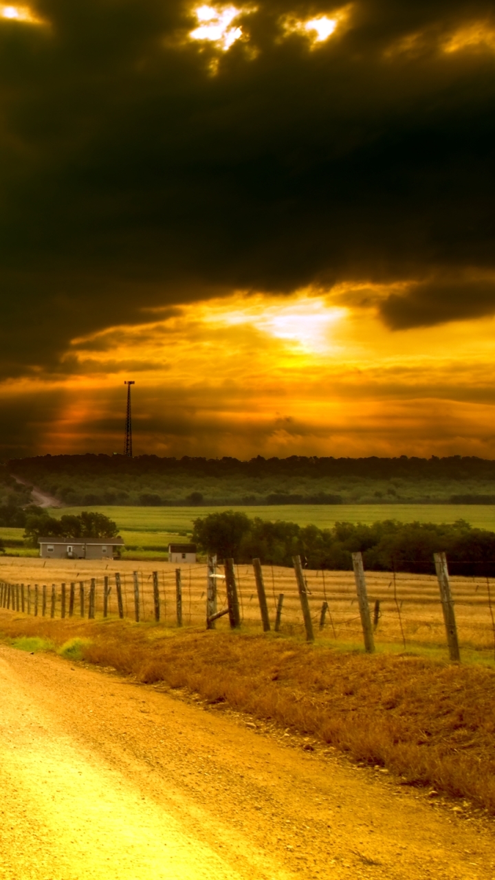 Download mobile wallpaper Sunset, Sun, Road, Field, Cloud, Photography for free.