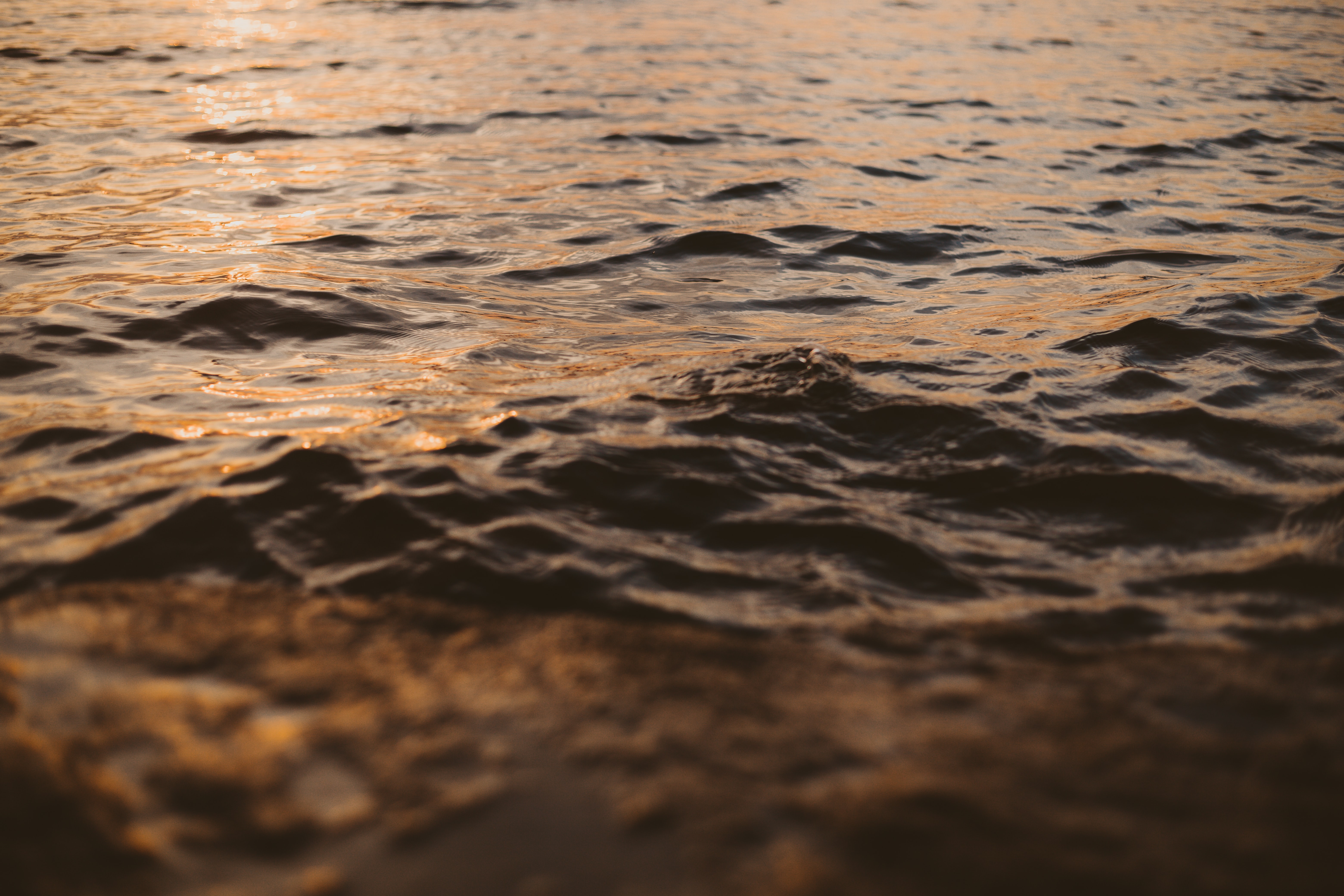 Download mobile wallpaper Ripples, Ripple, Waves, Nature, Glare, Water, Wavy, Sunset for free.