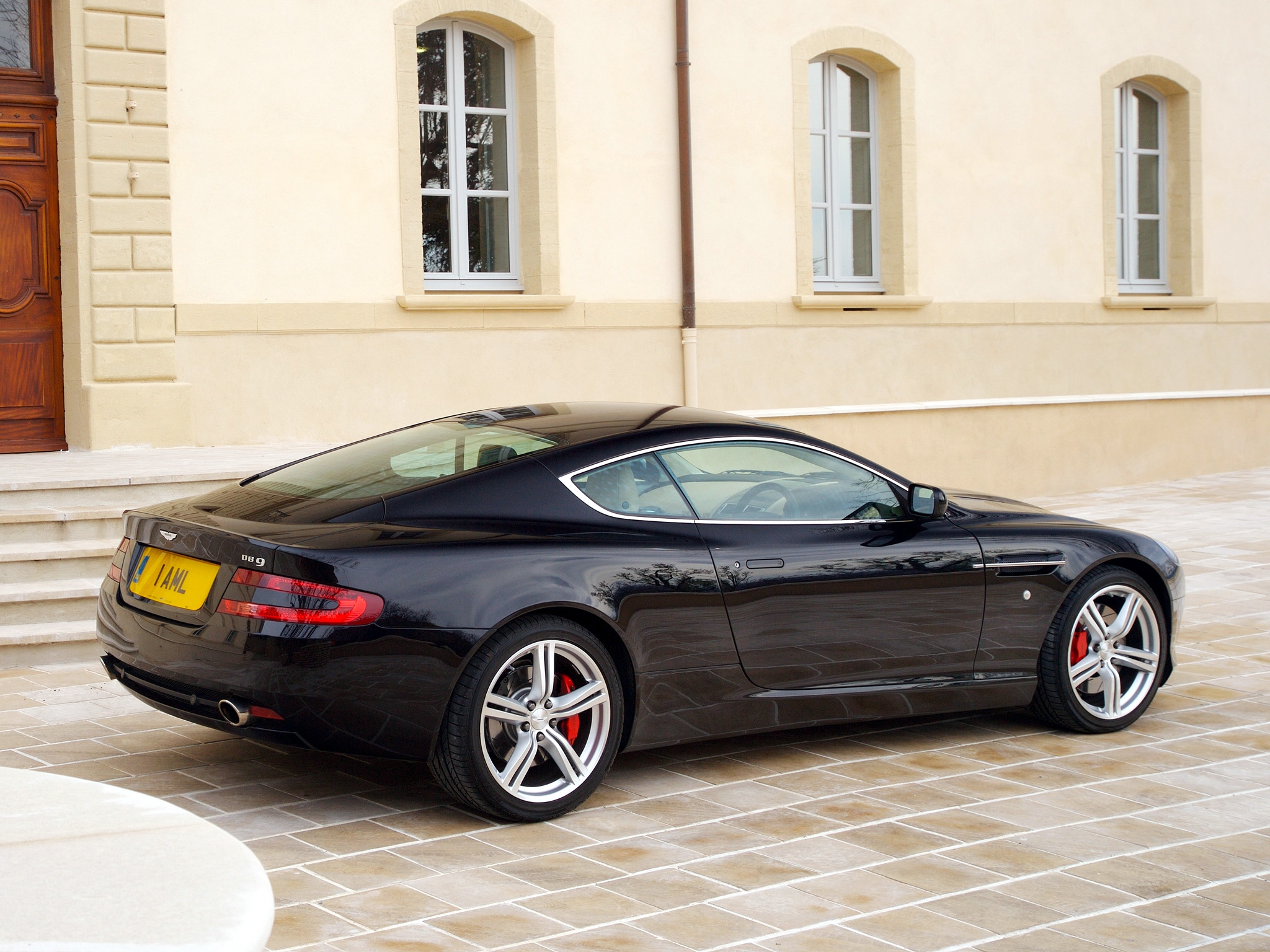 Free download wallpaper Auto, Building, Side View, Style, Db9, 2006, Aston Martin, Cars, Sports on your PC desktop