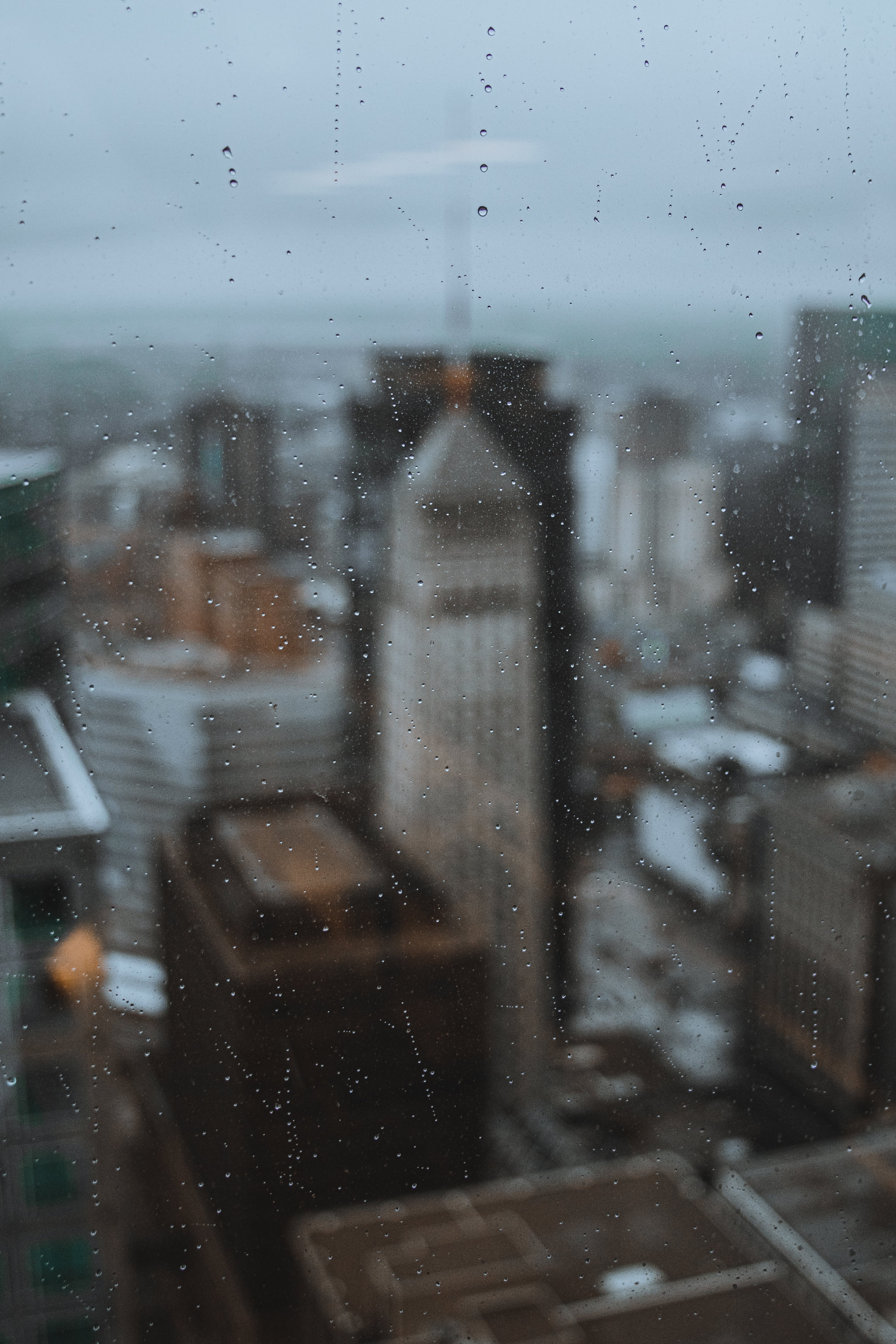 Download mobile wallpaper City, Building, Macro, Wet, Drops, Glass for free.