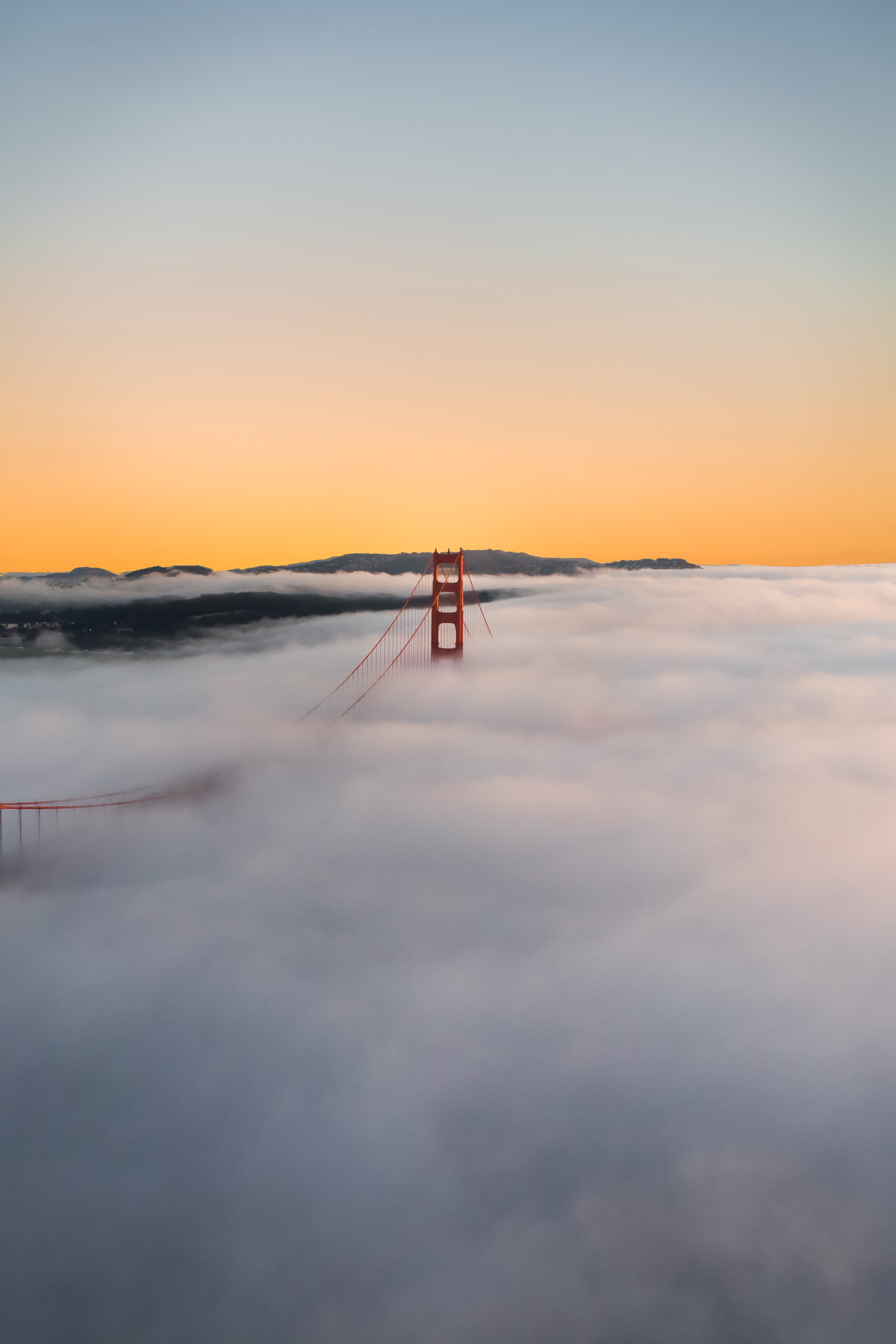 Download mobile wallpaper Clouds, Fog, Bridge, Mountains, Nature for free.