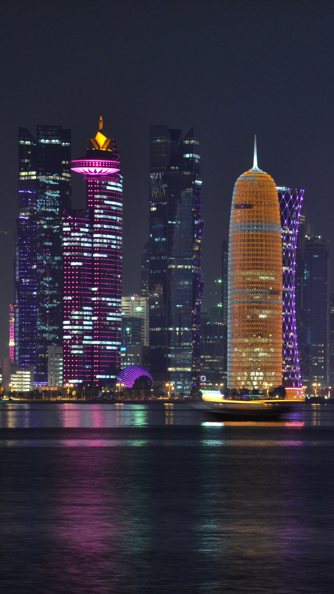 Download mobile wallpaper Cities, Night, City, Skyscraper, Building, Light, Doha, Qatar, Man Made for free.