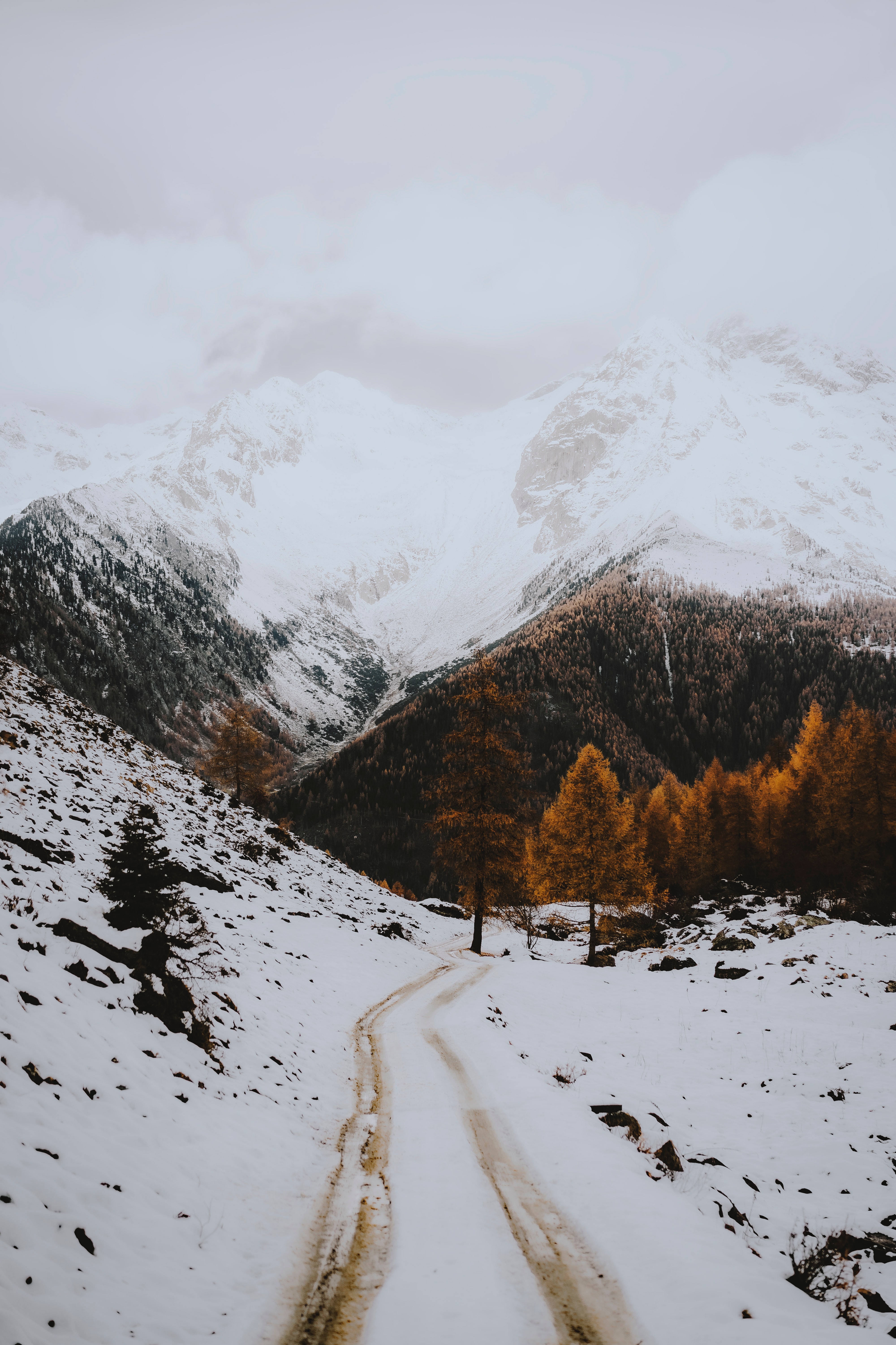 Download mobile wallpaper Nature, Road, Snow, Mountains, Winter, Landscape for free.