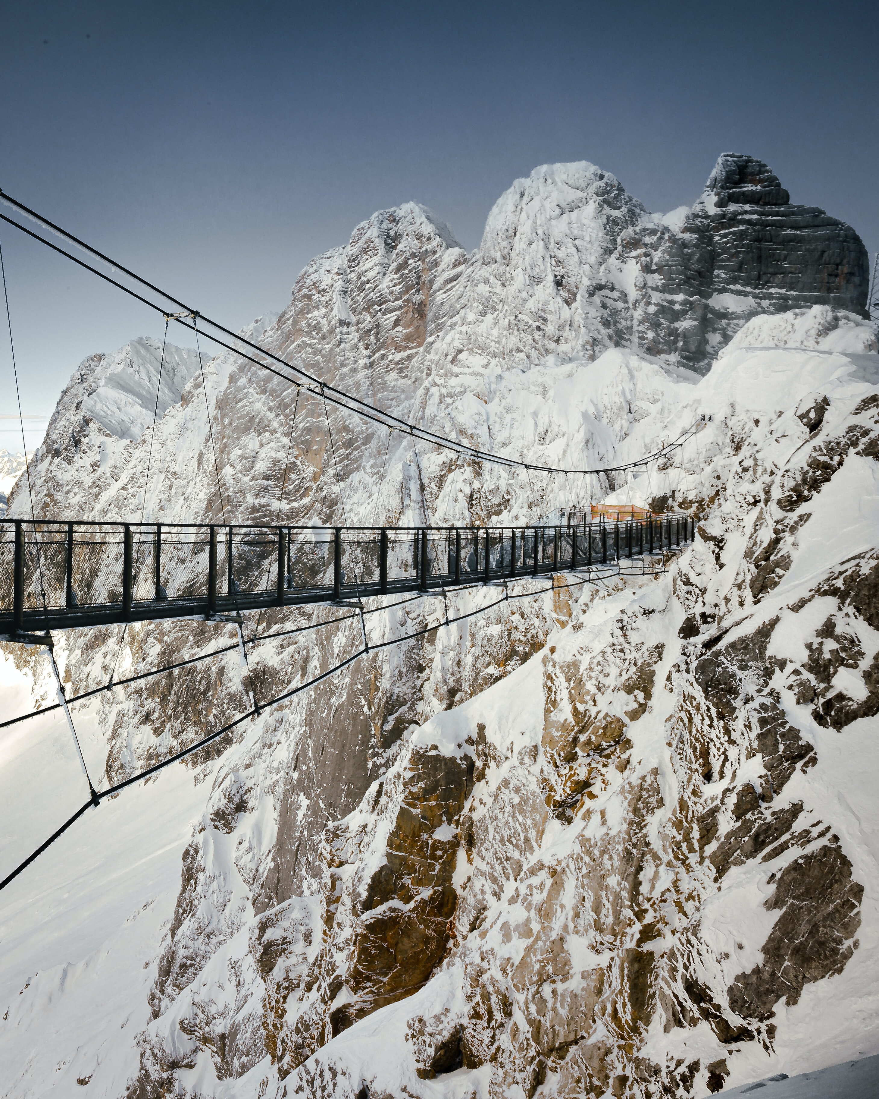 Download mobile wallpaper Winter, Bridge, Mountains, Snow, Nature for free.