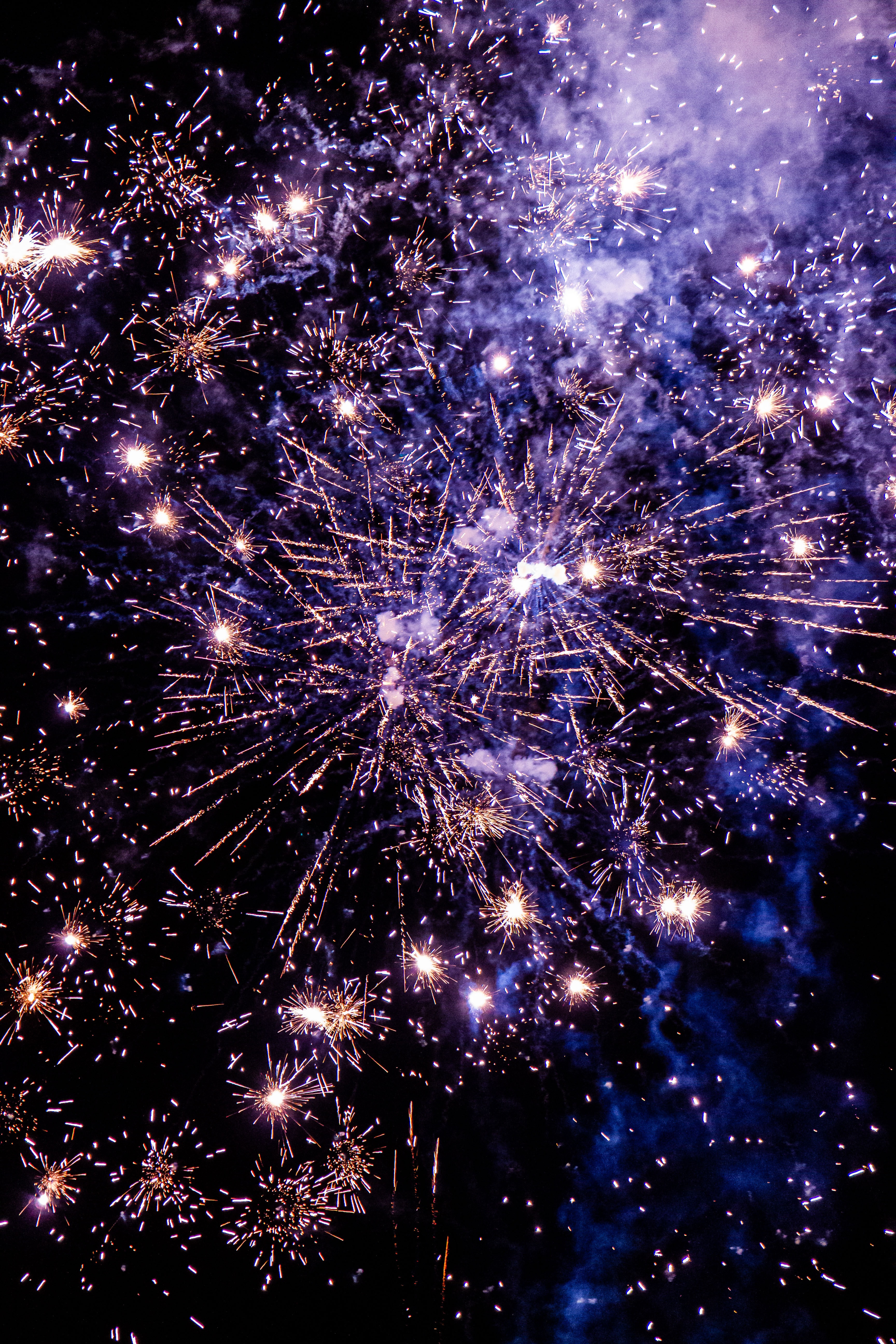Download mobile wallpaper Purple, Sparks, Holidays, Fireworks, Firework, Violet, Smoke for free.