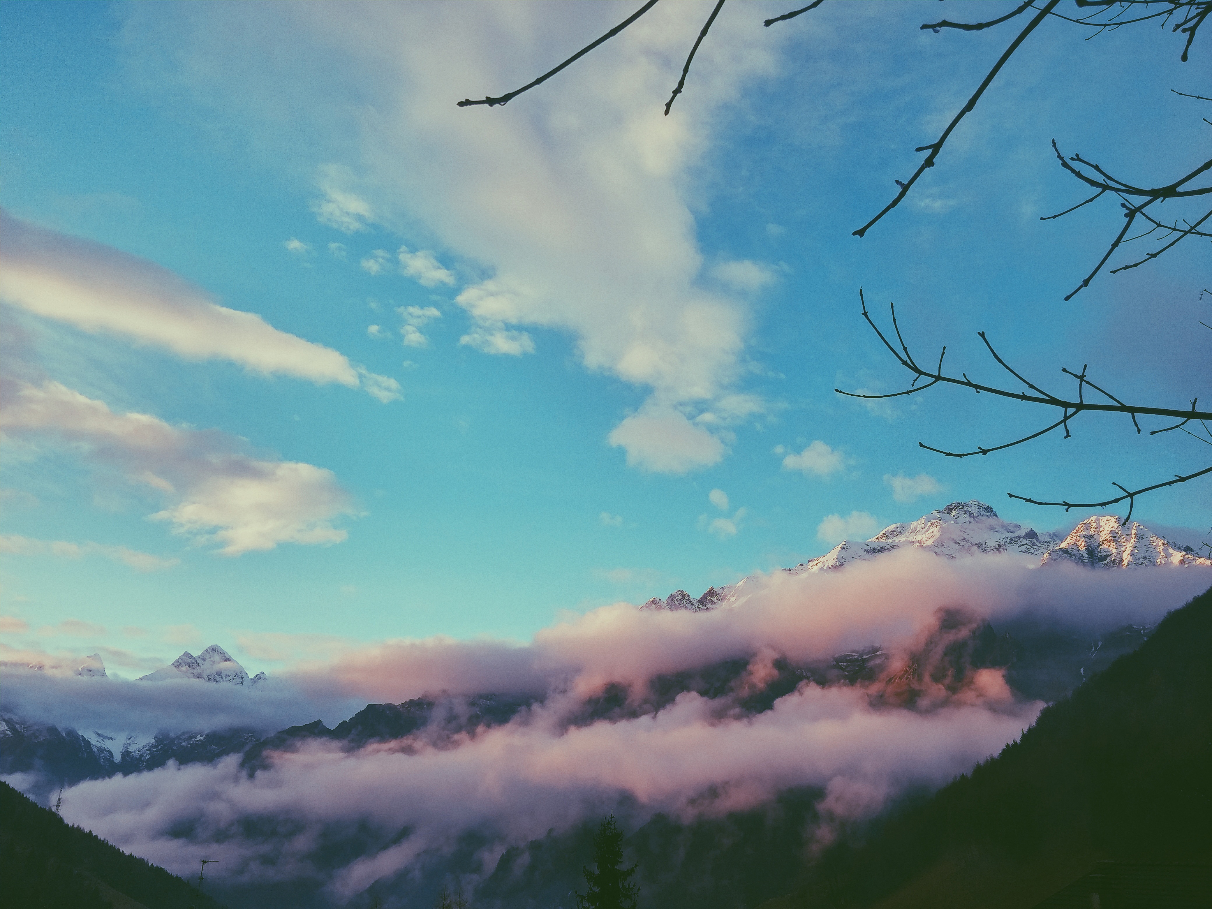 Download mobile wallpaper Fog, Top, Vertex, Nature, Sky, Mountains for free.