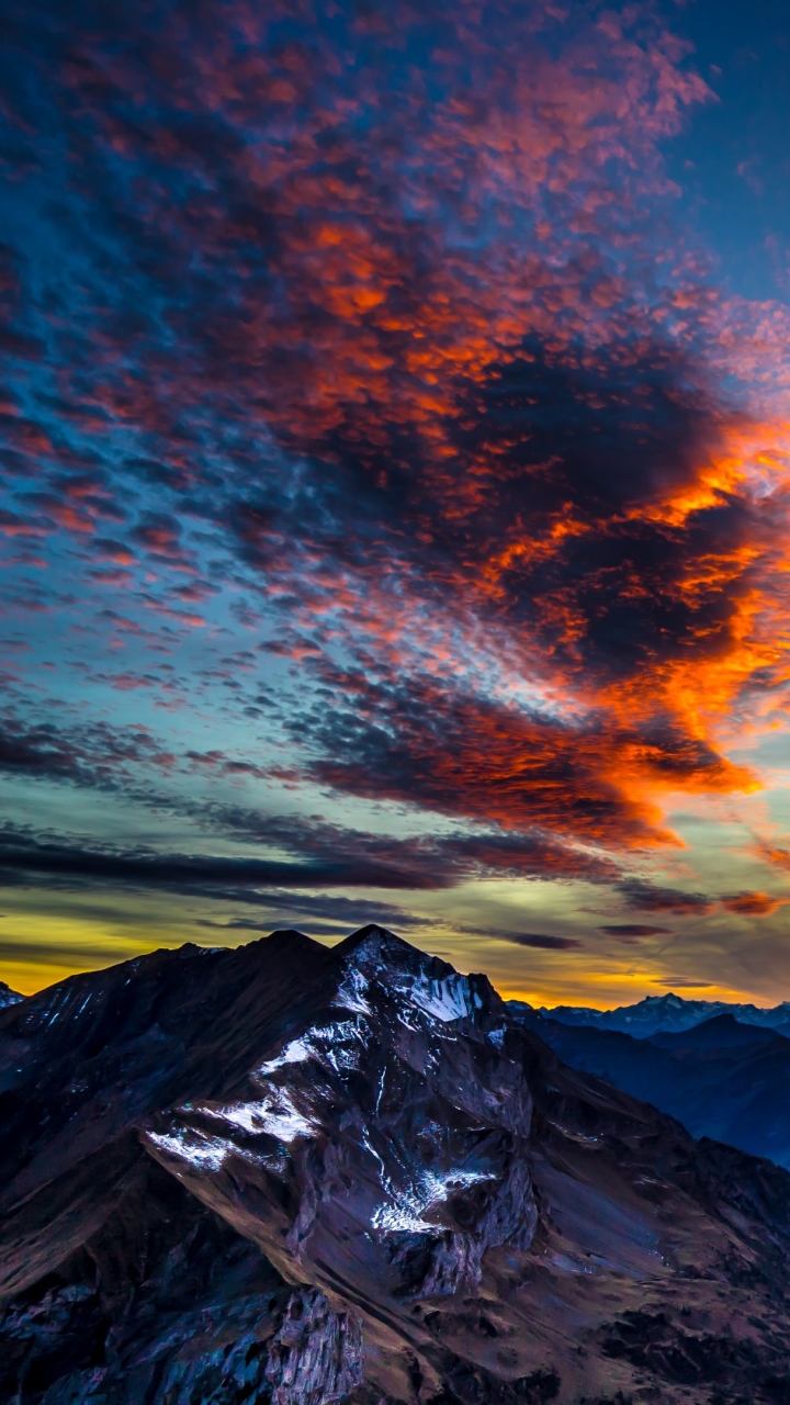 Download mobile wallpaper Sunset, Sky, Mountain, Earth, Cloud for free.