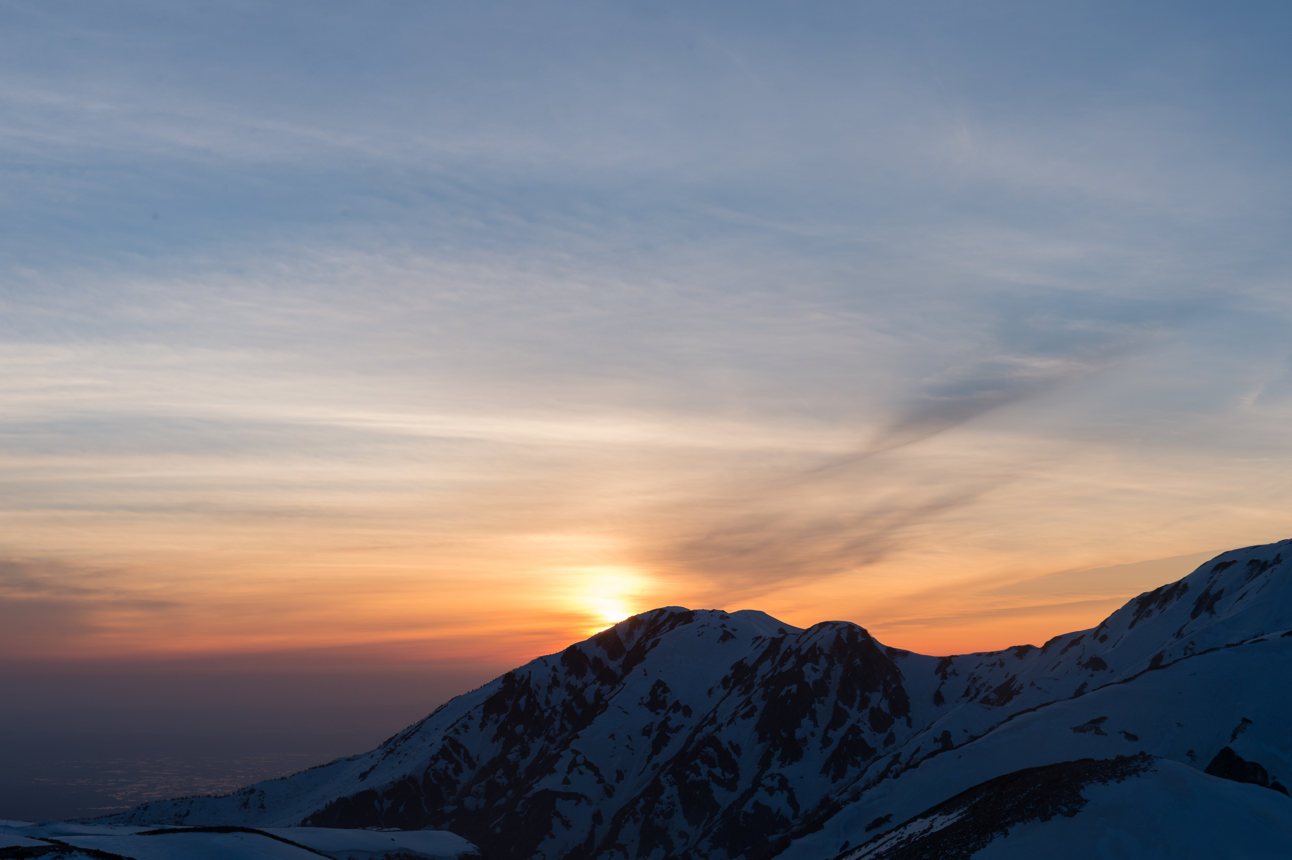 Download mobile wallpaper Snowbound, Sky, Snow Covered, Mountains, Nature, Sunset for free.