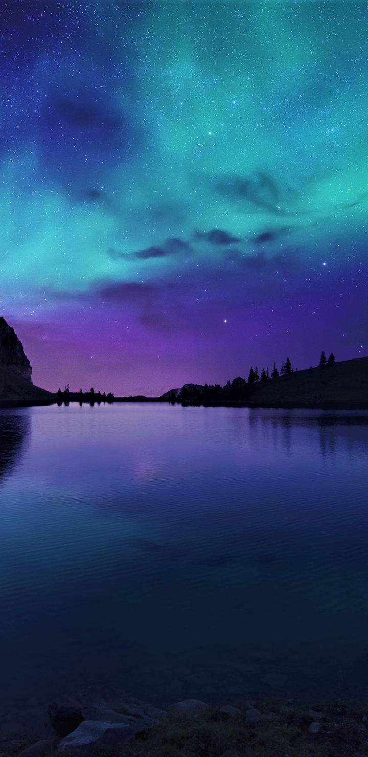 Download mobile wallpaper Stars, Night, Mountain, Lake, Light, Silhouette, Starry Sky, Earth, Aurora Borealis for free.