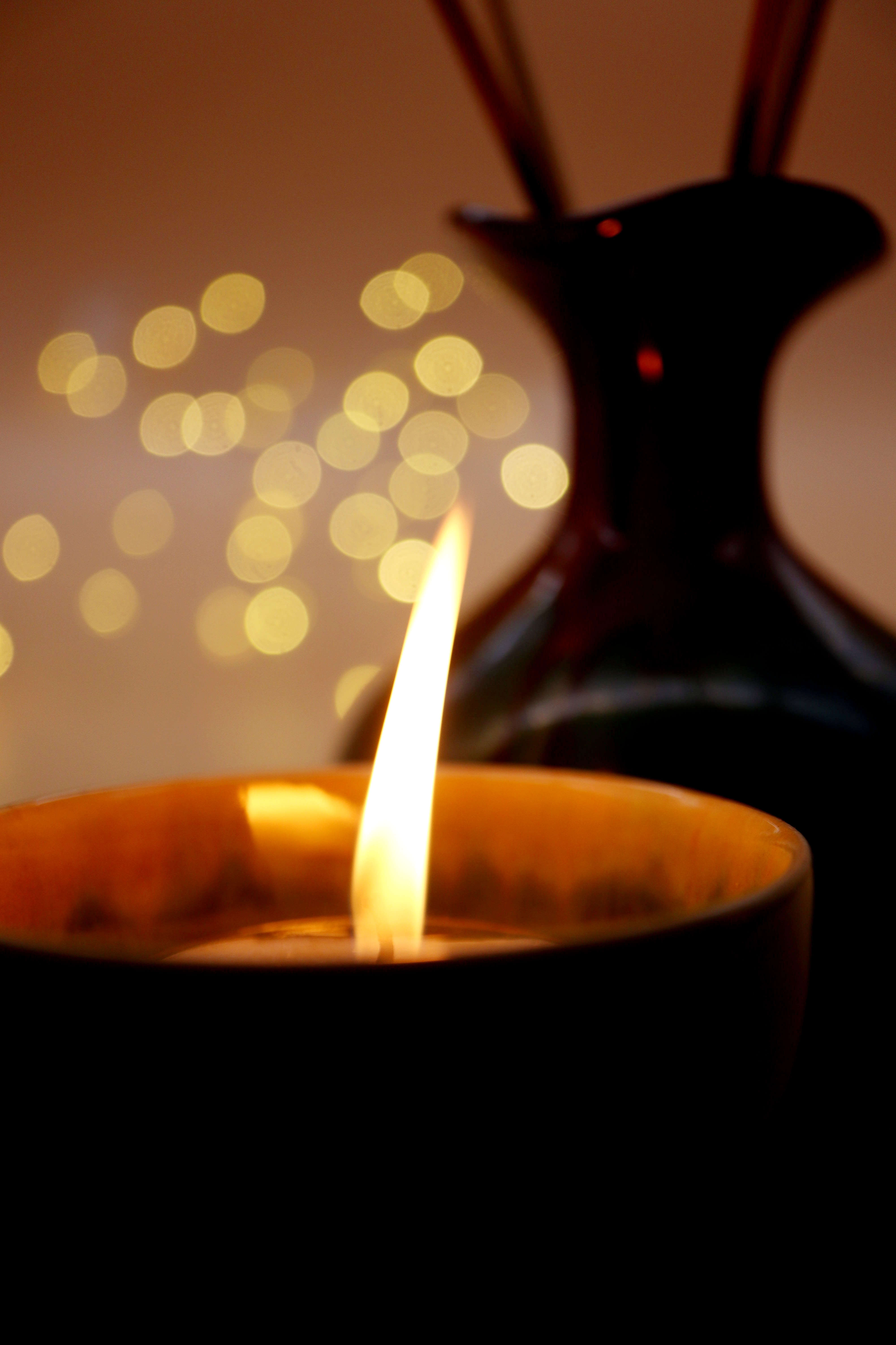 Download mobile wallpaper Macro, Glare, Light, Candle, Shine, Fire for free.