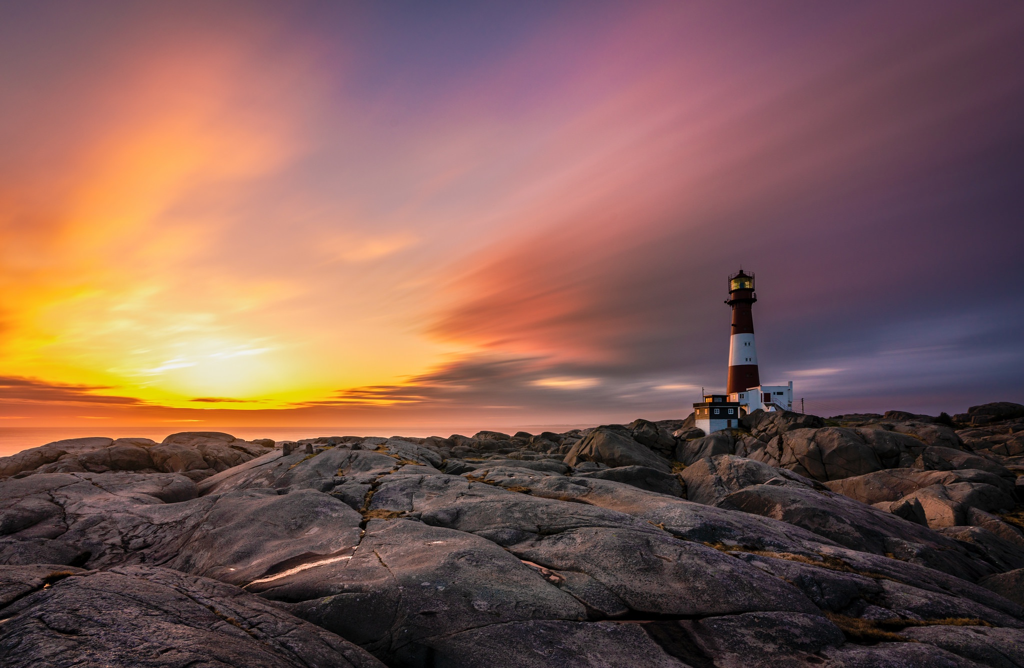 Free download wallpaper Sunset, Building, Horizon, Ocean, Lighthouse, Man Made on your PC desktop