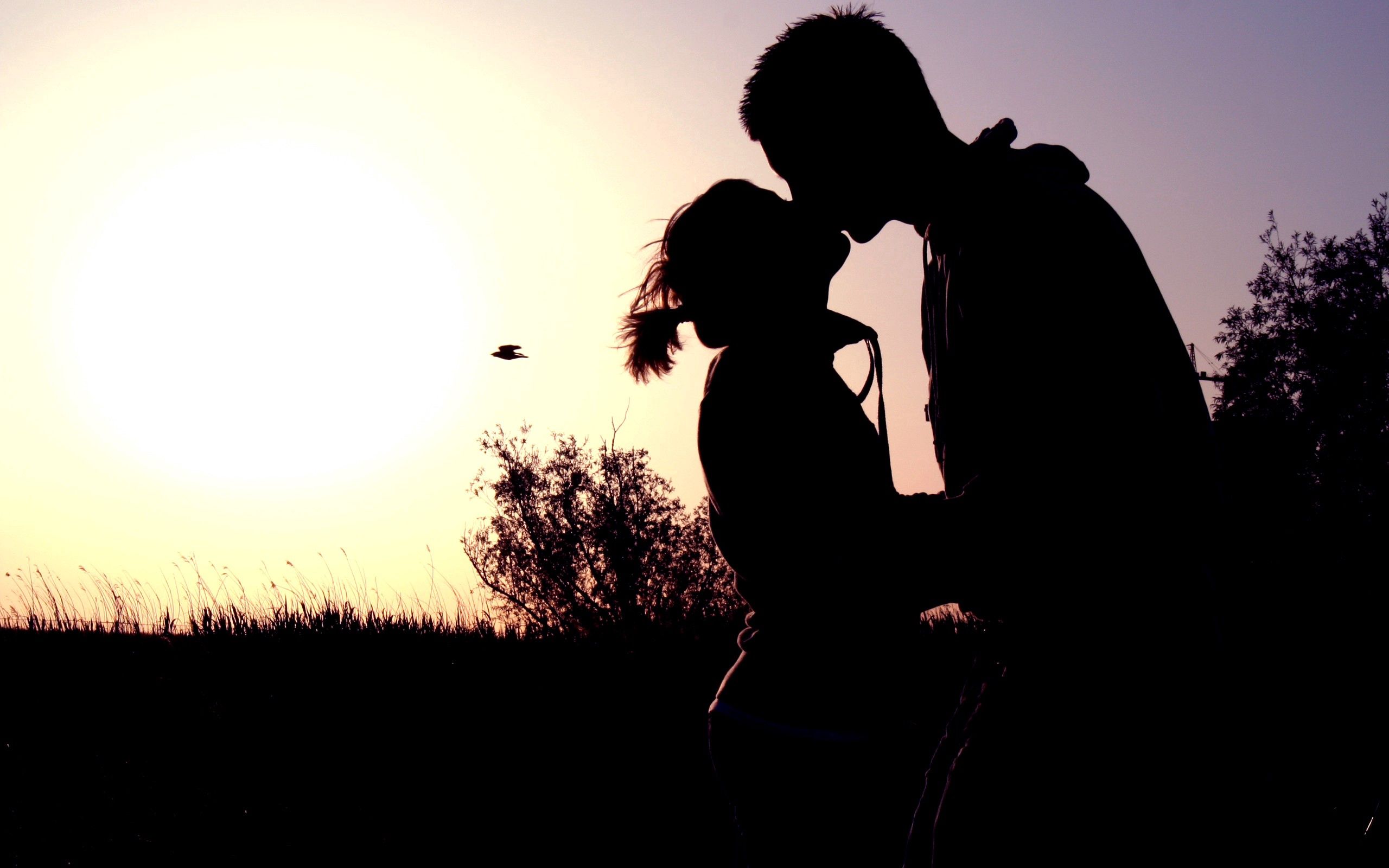 Download mobile wallpaper Shadow, Sunset, Romance, Pair, Kiss, Embrace, Couple, Love for free.