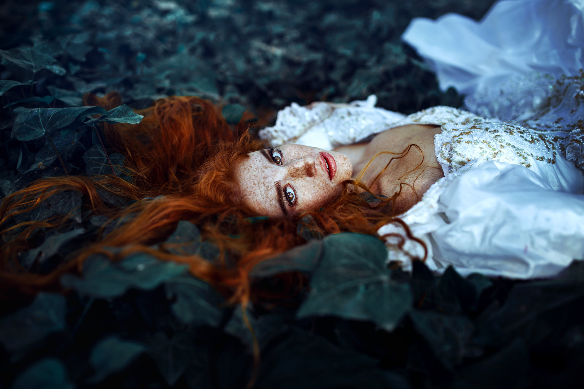 Download mobile wallpaper Leaf, Redhead, Model, Women, Freckles, Brown Eyes, Lying Down, White Dress for free.
