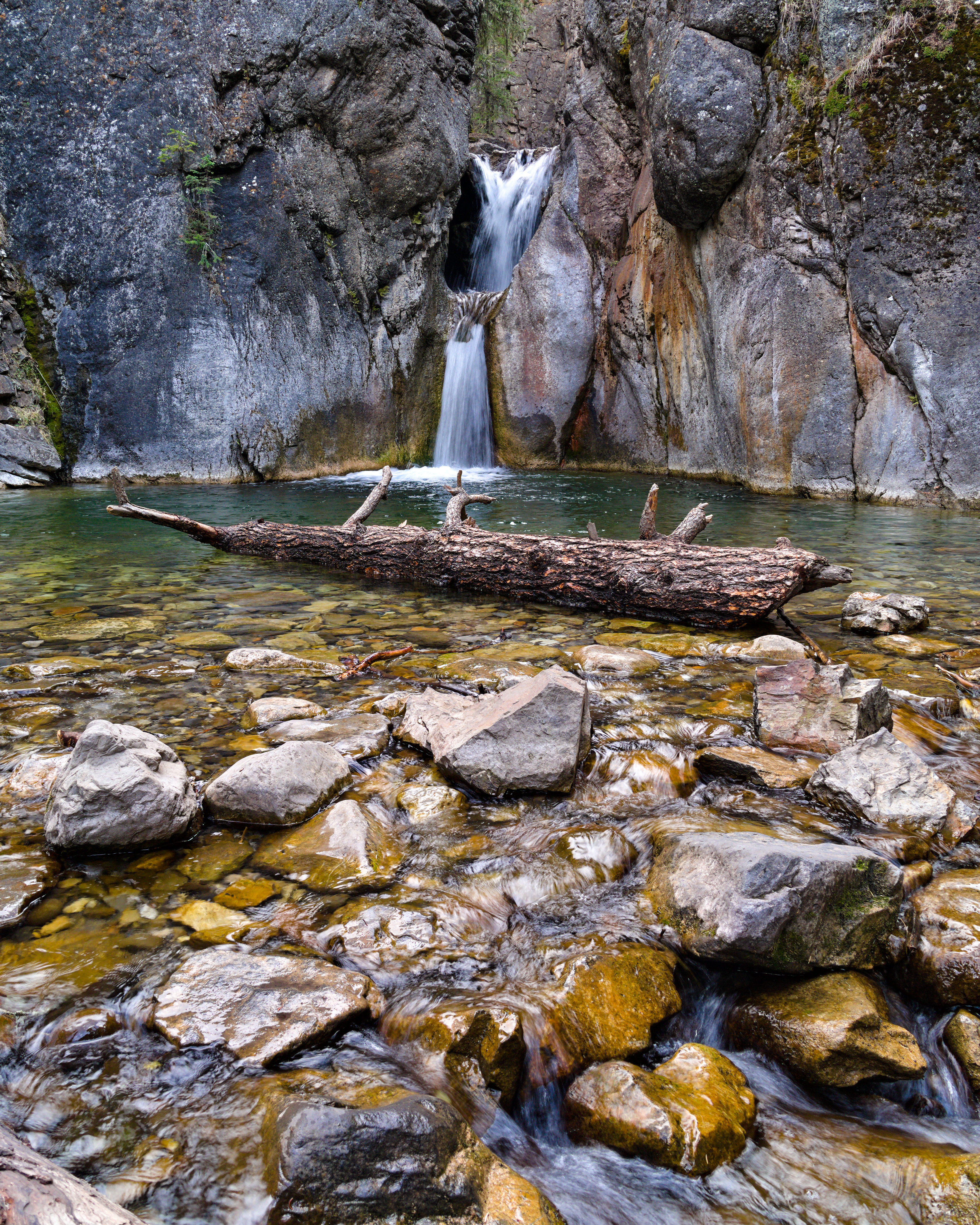 Free download wallpaper Stones, Rocks, Waterfall, Log, Nature, Water on your PC desktop