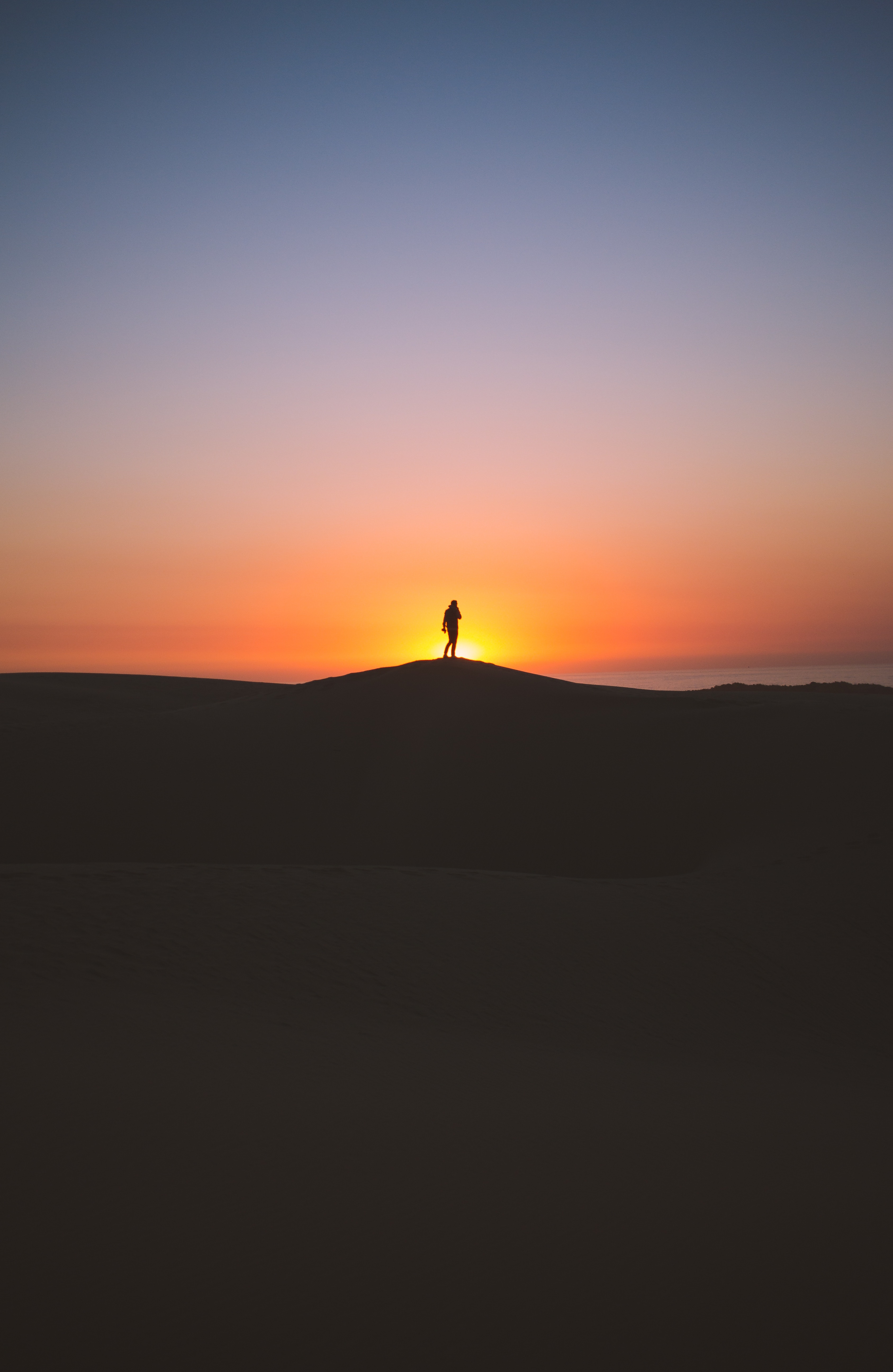 Download mobile wallpaper Nature, Sky, Sunset, Horizon, Person, Human, Silhouette for free.