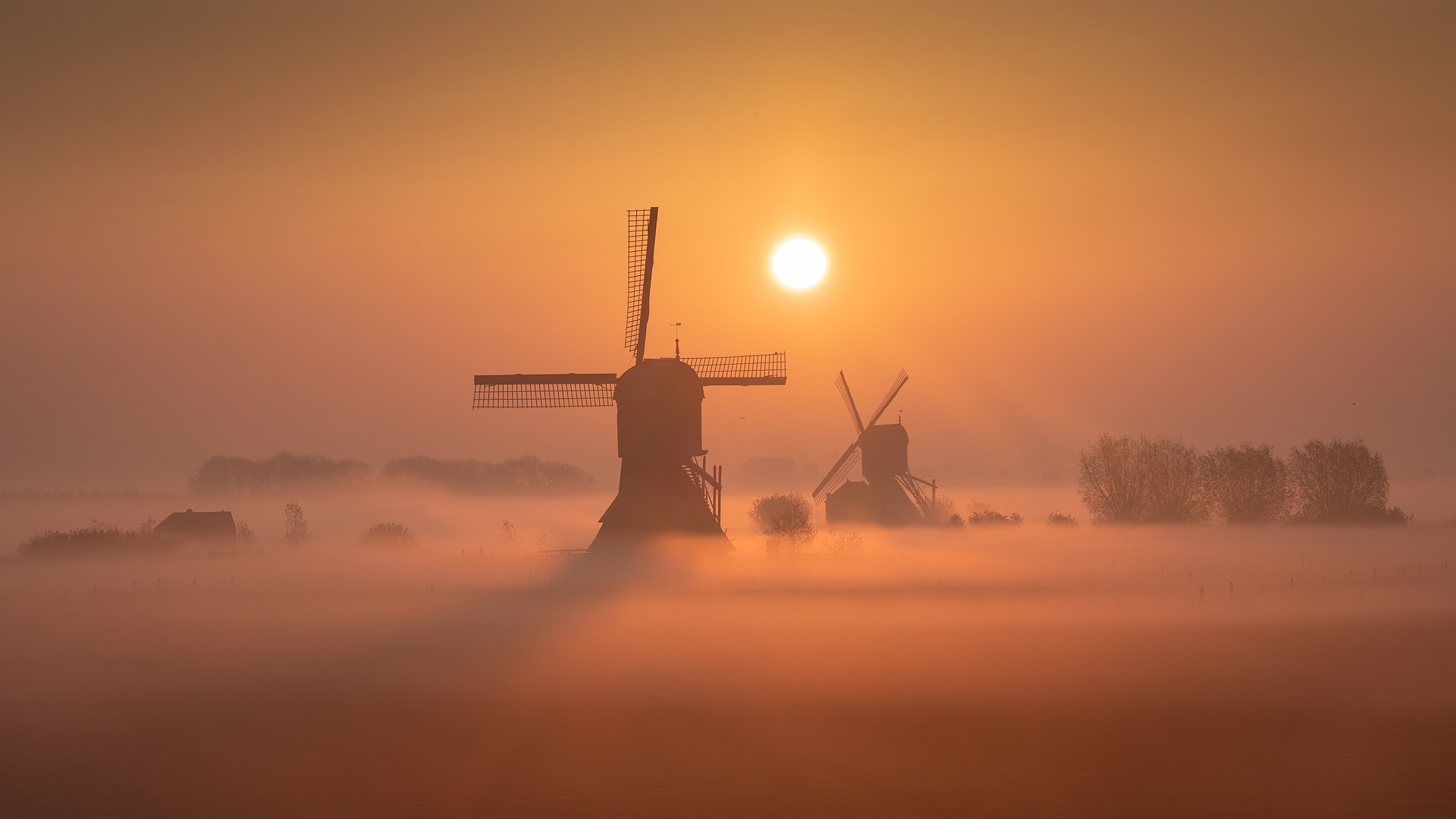 Download mobile wallpaper Fog, Netherlands, Windmill, Man Made for free.