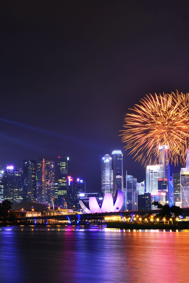 Download mobile wallpaper Cities, Night, Skyscraper, Building, Light, Singapore, Fireworks, Celebration, Man Made for free.