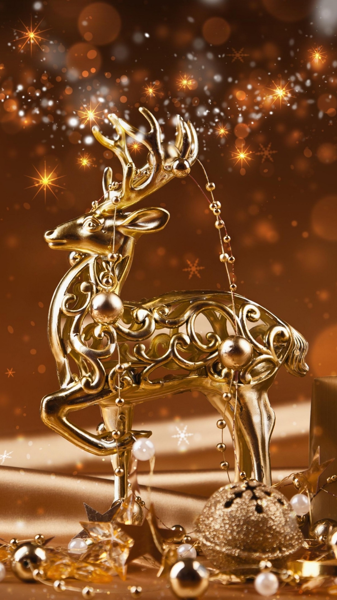 Download mobile wallpaper Gold, Christmas, Holiday, Gift, Bokeh, Christmas Ornaments, Reindeer for free.