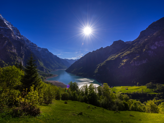 Handy-Wallpaper Landschaft, Berg, See, Schweiz, Gebirge, Sonne, Erde/natur kostenlos herunterladen.